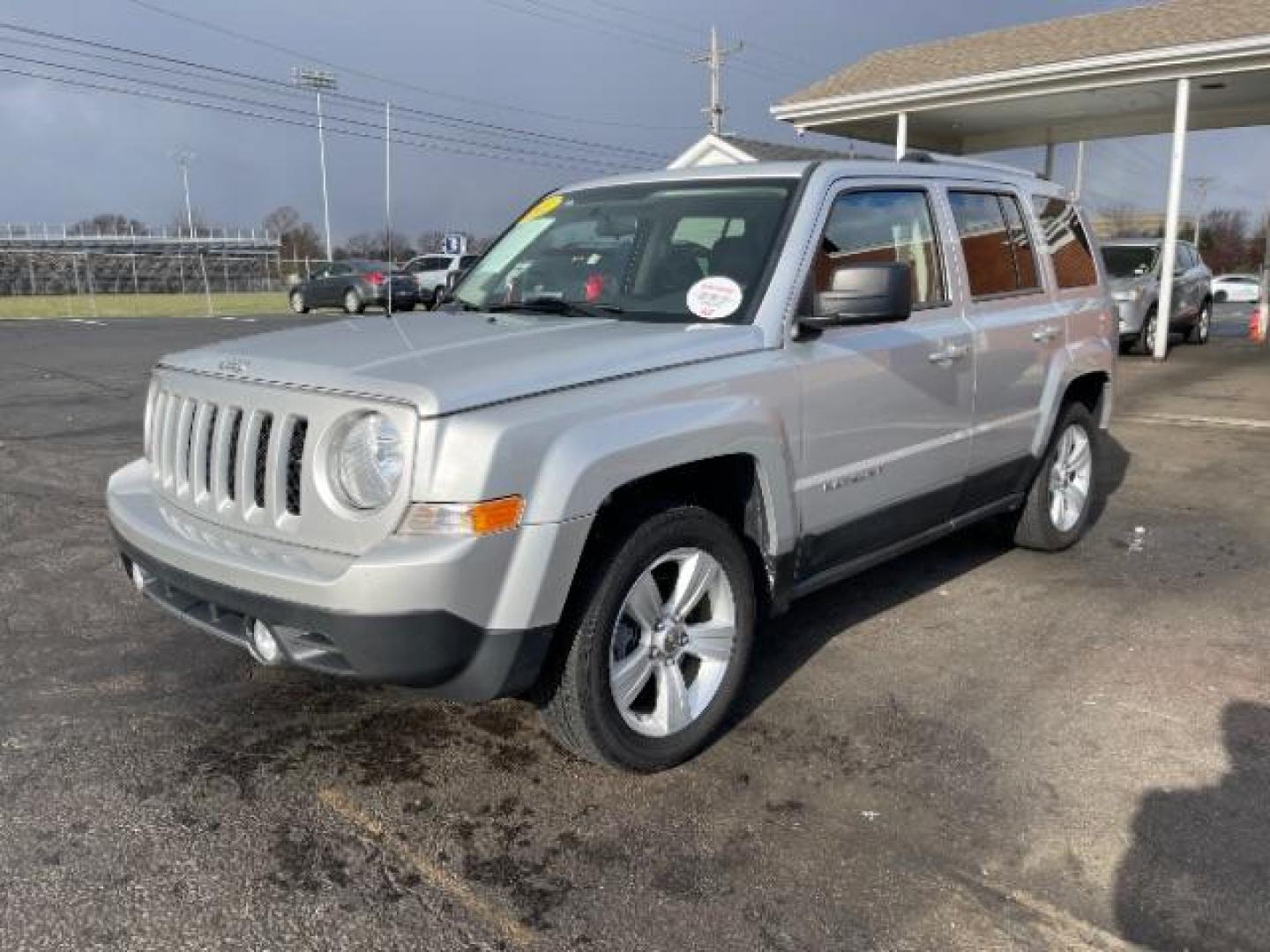 2011 Bright Silver Metallic Jeep Patriot Latitude X 4WD (1J4NF4GB8BD) with an 2.4L L4 DOHC 16V engine, located at 1099 N County Rd 25A , Troy, OH, 45373, (937) 908-9800, 40.057079, -84.212883 - Photo#2