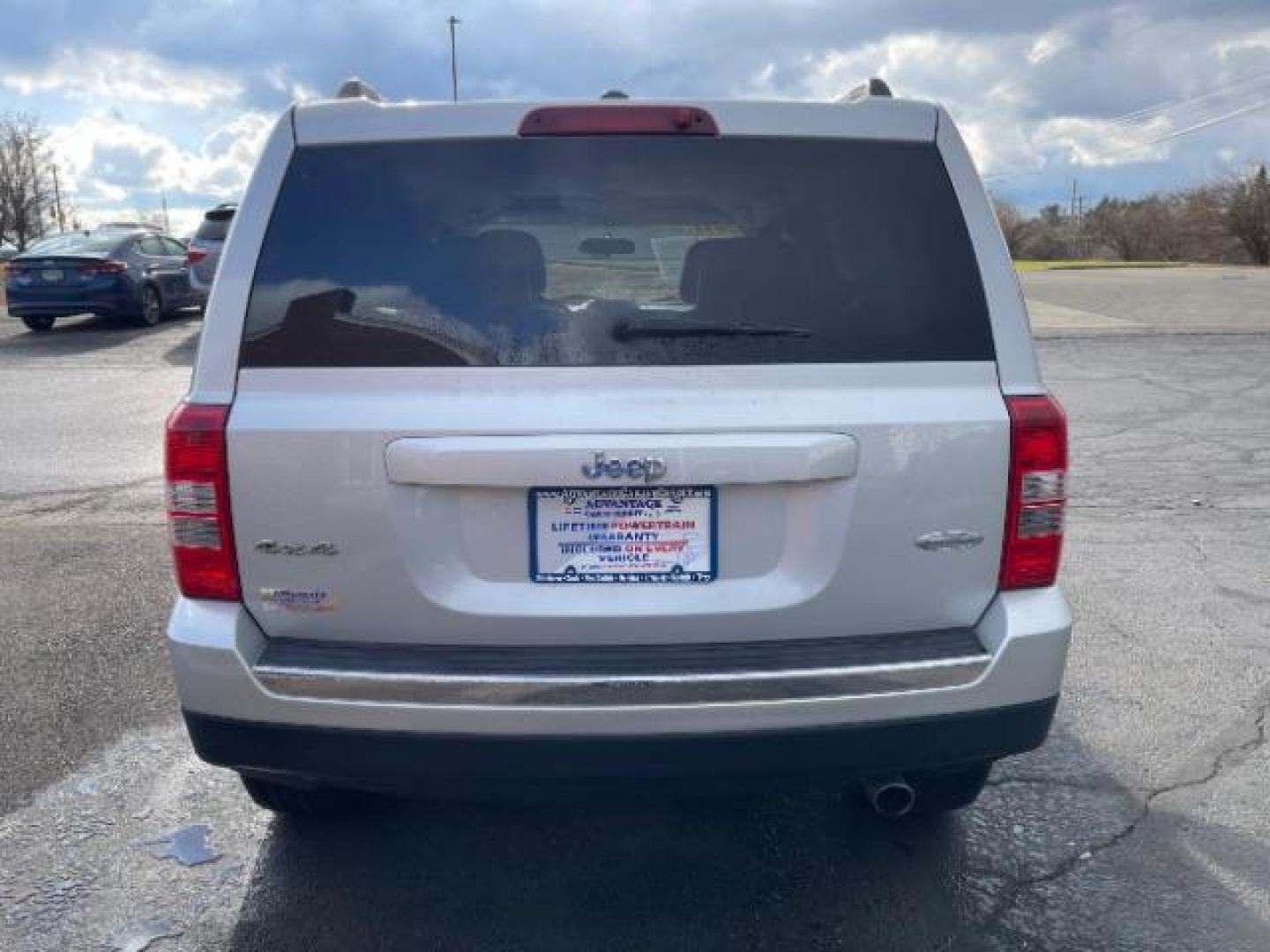 2011 Bright Silver Metallic Jeep Patriot Latitude X 4WD (1J4NF4GB8BD) with an 2.4L L4 DOHC 16V engine, located at 1099 N County Rd 25A , Troy, OH, 45373, (937) 908-9800, 40.057079, -84.212883 - Photo#5