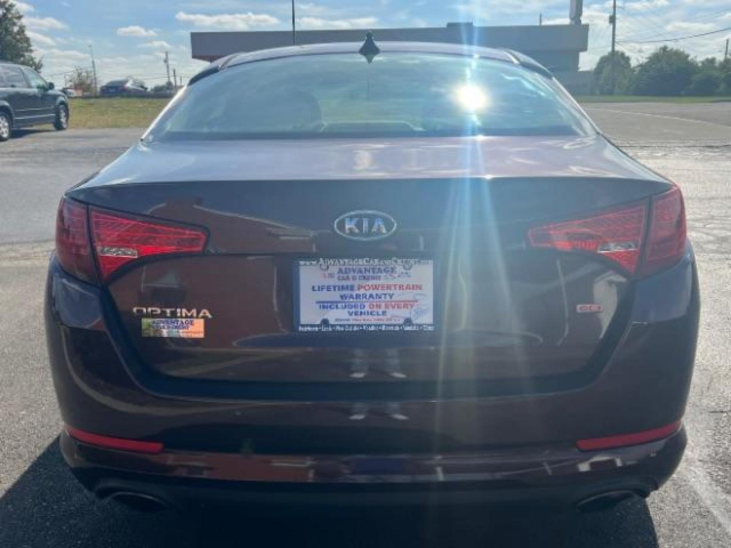 2011 Dark Cherry Kia Optima LX AT (KNAGM4A72B5) with an 2.4L L4 DOHC 16V engine, 6-Speed Automatic transmission, located at 1951 S Dayton Lakeview Rd., New Carlisle, OH, 45344, (937) 908-9800, 39.890999, -84.050255 - Photo#4