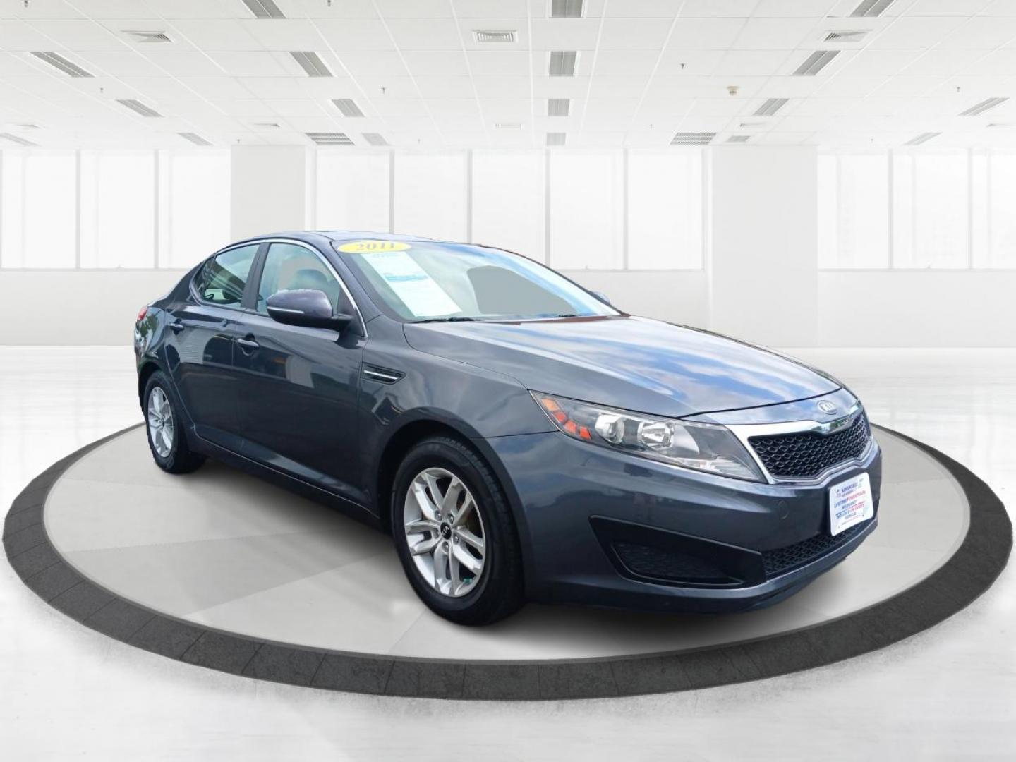 2011 Satin Metal Kia Optima LX AT (KNAGM4A7XB5) with an 2.4L L4 DOHC 16V engine, 6-Speed Automatic transmission, located at 1099 N County Rd 25A , Troy, OH, 45373, (937) 908-9800, 40.057079, -84.212883 - Photo#0