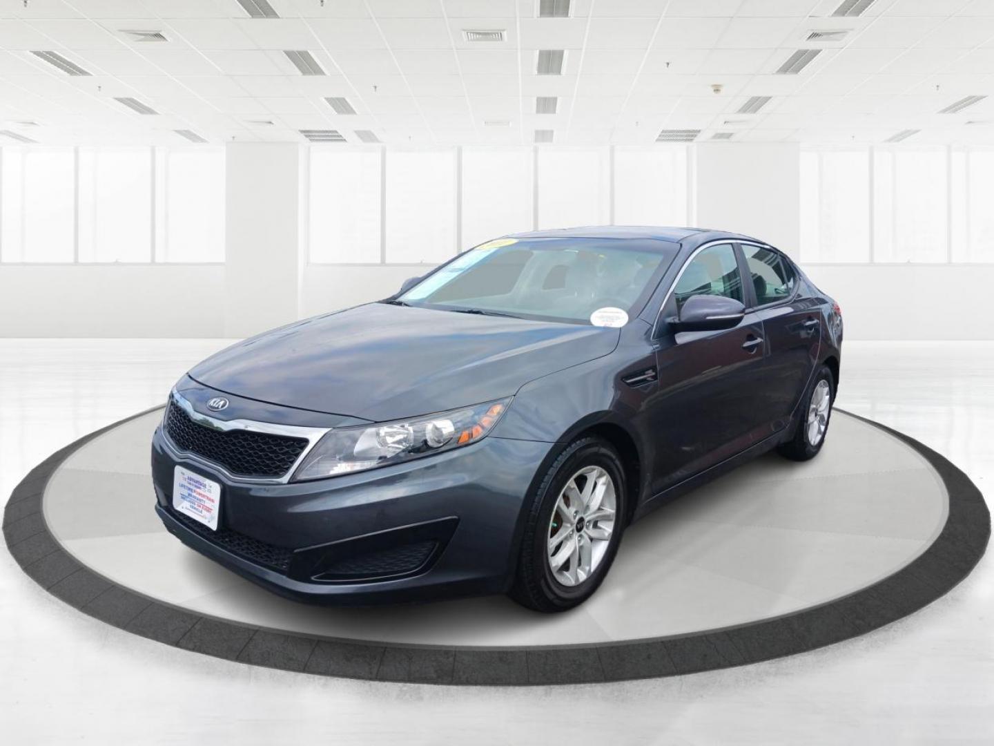 2011 Satin Metal Kia Optima LX AT (KNAGM4A7XB5) with an 2.4L L4 DOHC 16V engine, 6-Speed Automatic transmission, located at 1099 N County Rd 25A , Troy, OH, 45373, (937) 908-9800, 40.057079, -84.212883 - Photo#7