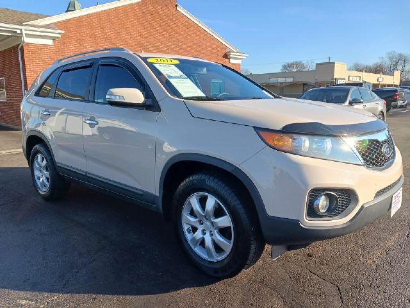 2011 White Sand Beige Kia Sorento LX 2WD (5XYKT4A17BG) with an 2.4L L4 DOHC 16V engine, 6-Speed Automatic transmission, located at 1951 S Dayton Lakeview Rd., New Carlisle, OH, 45344, (937) 908-9800, 39.890999, -84.050255 - Photo#0