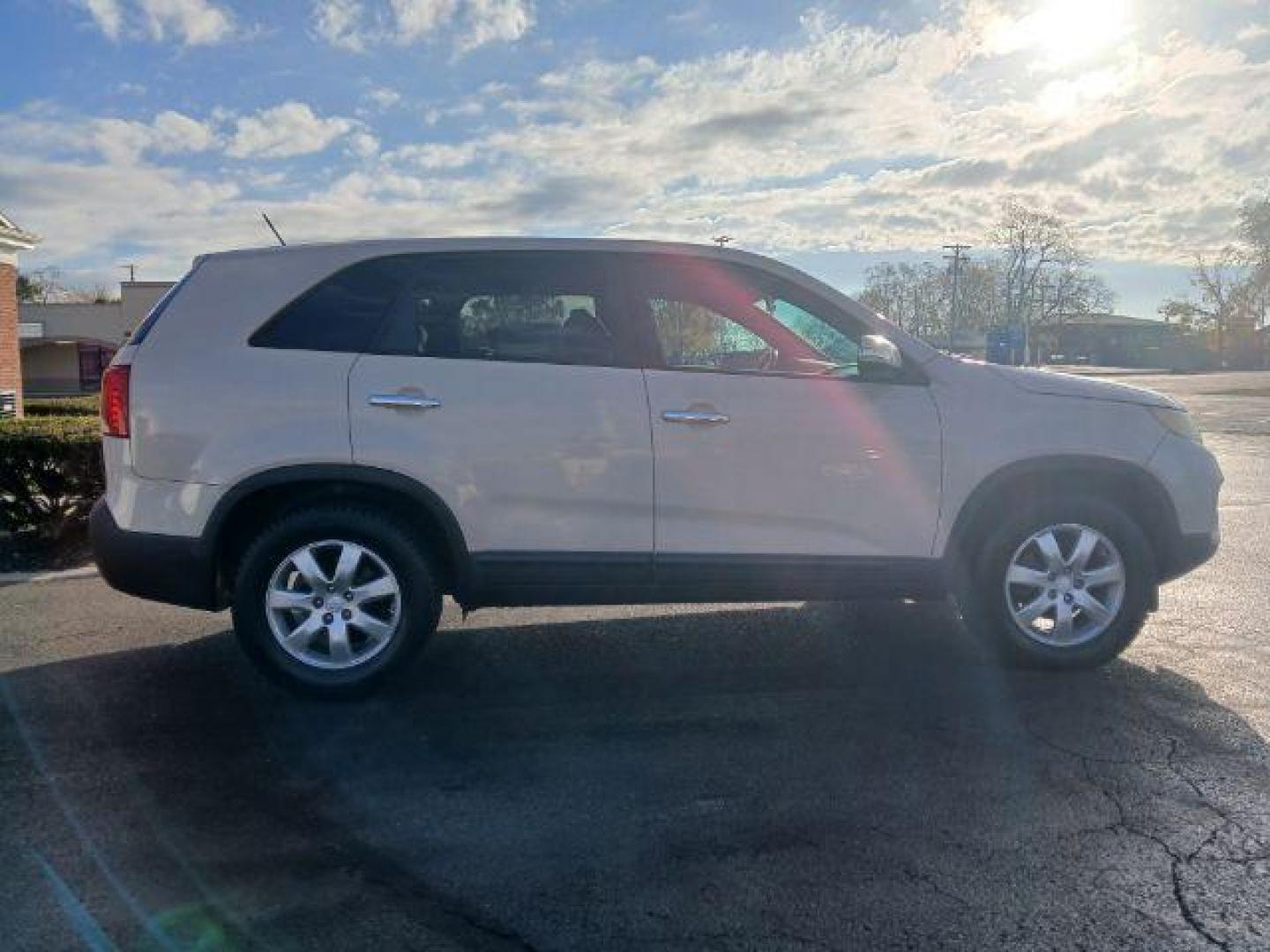 2011 Snow White Pearl Kia Sorento LX 2WD (5XYKT3A14BG) with an 2.4L L4 DOHC 16V engine, 6-Speed Automatic transmission, located at 1951 S Dayton Lakeview Rd., New Carlisle, OH, 45344, (937) 908-9800, 39.890999, -84.050255 - 2011 Kia Sorento LX 2WD - Photo#16