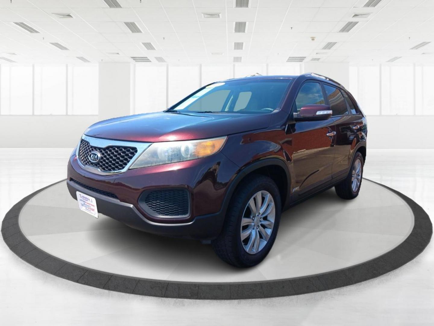 2011 Dark Cherry Kia Sorento LX 4WD (5XYKTDA22BG) with an 3.5L V6 DOHC 24V engine, 6-Speed Automatic transmission, located at 1230 East Main St, Xenia, OH, 45385, (937) 908-9800, 39.688026, -83.910172 - Photo#4