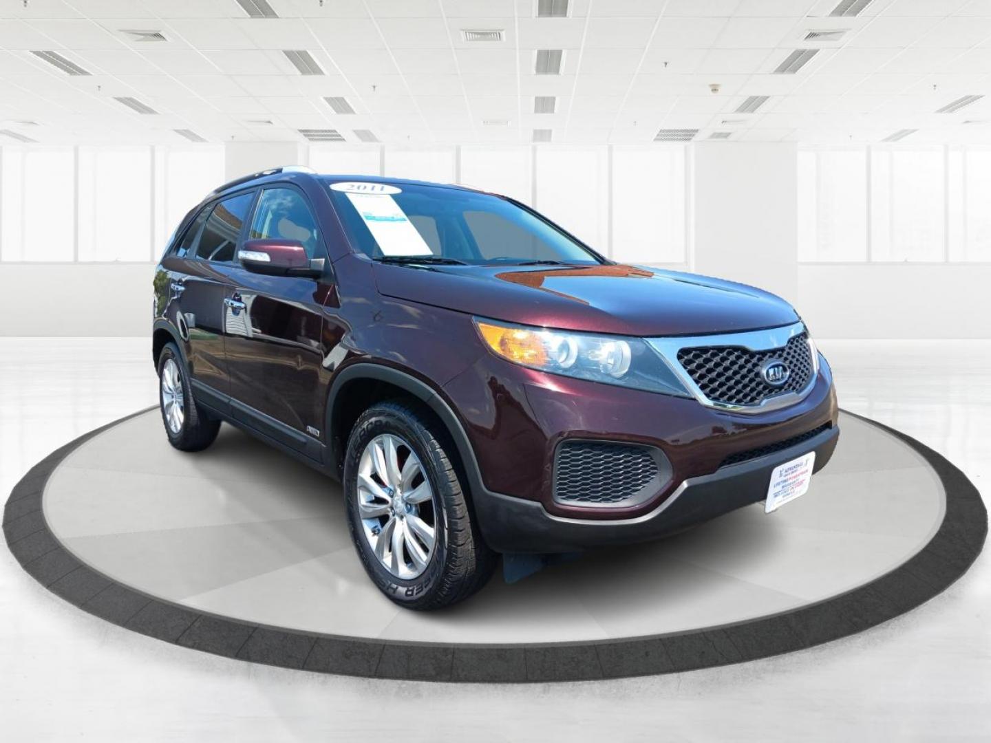 2011 Dark Cherry Kia Sorento LX 4WD (5XYKTDA22BG) with an 3.5L V6 DOHC 24V engine, 6-Speed Automatic transmission, located at 1230 East Main St, Xenia, OH, 45385, (937) 908-9800, 39.688026, -83.910172 - Photo#5