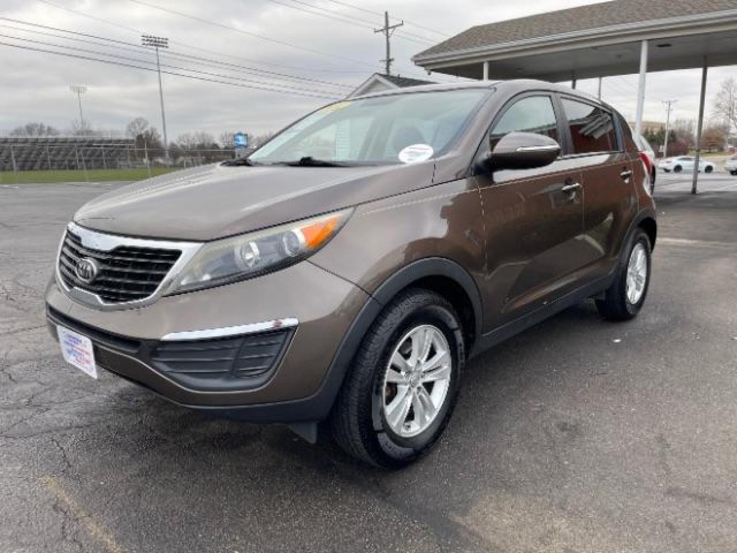 2011 Sand Track Kia Sportage LX FWD (KNDPB3A29B7) with an 2.4L V6 DOHC 24V engine, 6-Speed Automatic transmission, located at 401 Woodman Dr, Riverside, OH, 45431, (937) 908-9800, 39.760899, -84.123421 - Photo#1