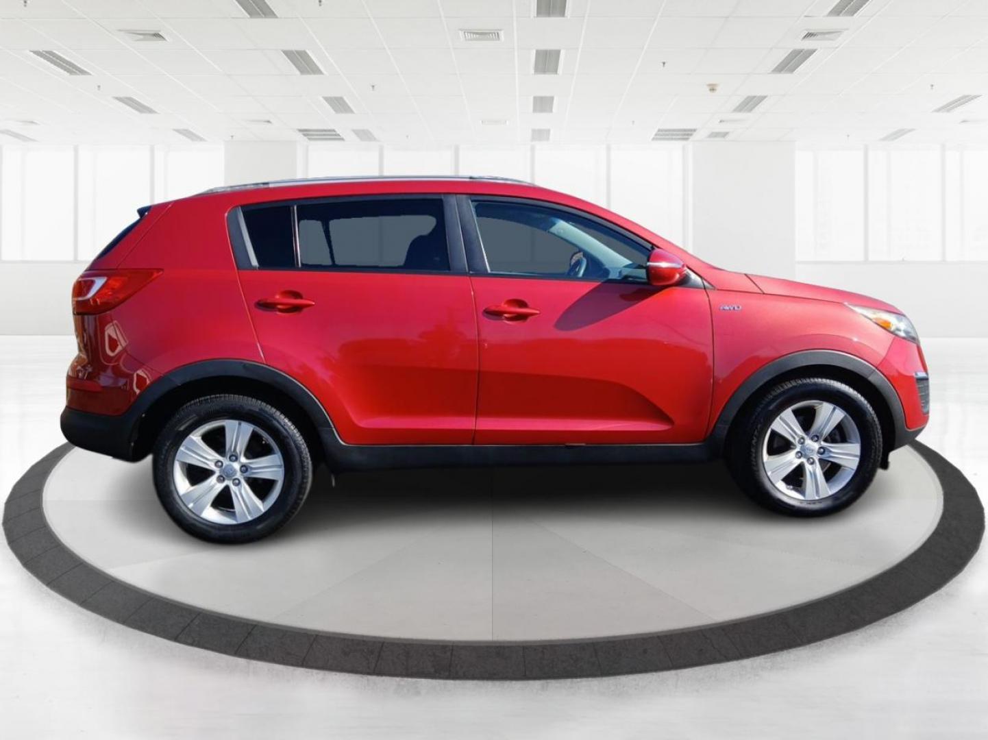 2011 Signal Red Metallic Kia Sportage LX AWD (KNDPBCA29B7) with an 2.4L V6 DOHC 24V engine, 6-Speed Automatic transmission, located at 880 E. National Road, Vandalia, OH, 45377, (937) 908-9800, 39.891918, -84.183594 - Photo#1