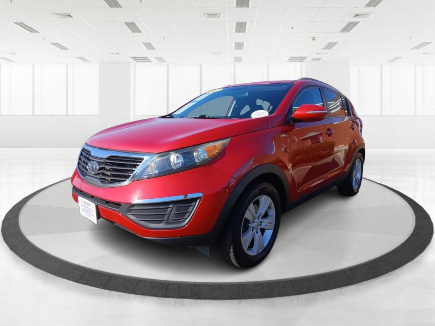 2011 Signal Red Metallic Kia Sportage LX AWD (KNDPBCA29B7) with an 2.4L V6 DOHC 24V engine, 6-Speed Automatic transmission, located at 880 E. National Road, Vandalia, OH, 45377, (937) 908-9800, 39.891918, -84.183594 - Photo#7