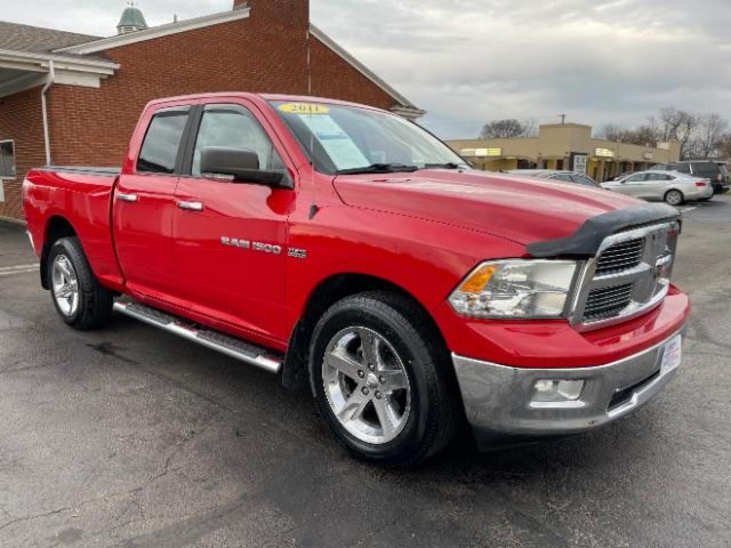 2011 Deep Cherry Red Crystal Pearl RAM 1500 ST Quad Cab 4WD (1D7RV1GT7BS) with an 5.7L V8 OHV 16V engine, 5-Speed Automatic transmission, located at 1184 Kauffman Ave, Fairborn, OH, 45324, (937) 908-9800, 39.807072, -84.030914 - Photo#0