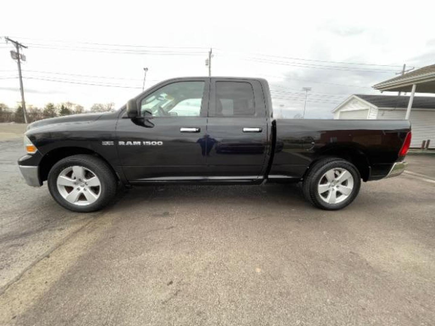 2011 Brilliant Black Crystal Pearl RAM 1500 ST Quad Cab 4WD (1D7RV1GT0BS) with an 5.7L V8 OHV 16V engine, 5-Speed Automatic transmission, located at 1230 East Main St, Xenia, OH, 45385, (937) 908-9800, 39.688026, -83.910172 - Photo#2