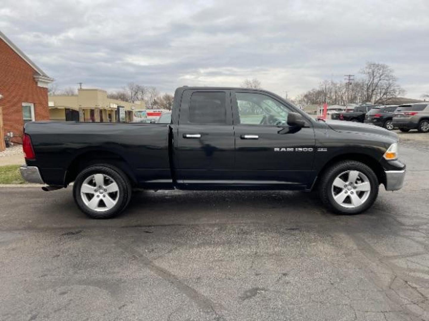 2011 Brilliant Black Crystal Pearl RAM 1500 ST Quad Cab 4WD (1D7RV1GT0BS) with an 5.7L V8 OHV 16V engine, 5-Speed Automatic transmission, located at 1230 East Main St, Xenia, OH, 45385, (937) 908-9800, 39.688026, -83.910172 - Photo#3