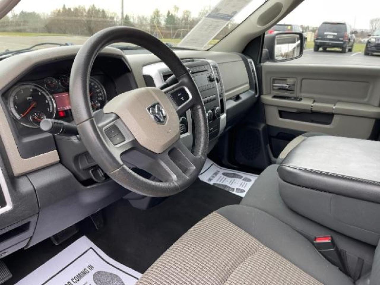 2011 Brilliant Black Crystal Pearl RAM 1500 ST Quad Cab 4WD (1D7RV1GT0BS) with an 5.7L V8 OHV 16V engine, 5-Speed Automatic transmission, located at 1230 East Main St, Xenia, OH, 45385, (937) 908-9800, 39.688026, -83.910172 - Photo#7