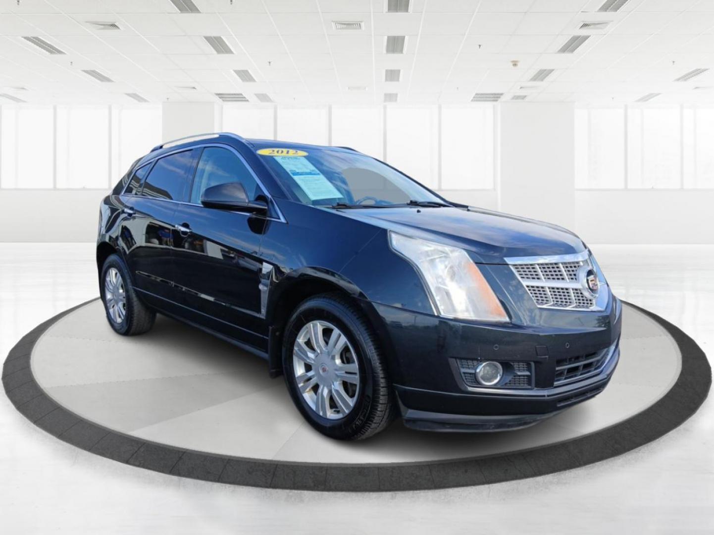 2012 Black Raven Cadillac SRX Luxury AWD (3GYFNDE34CS) with an 3.6L V6 DOHC 24V FFV engine, 6-Speed Automatic transmission, located at 1951 S Dayton Lakeview Rd., New Carlisle, OH, 45344, (937) 908-9800, 39.890999, -84.050255 - Photo#0