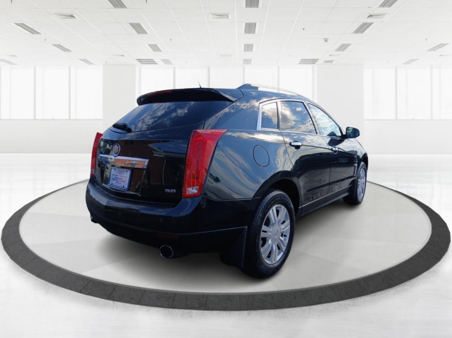 2012 Black Raven Cadillac SRX Luxury AWD (3GYFNDE34CS) with an 3.6L V6 DOHC 24V FFV engine, 6-Speed Automatic transmission, located at 1951 S Dayton Lakeview Rd., New Carlisle, OH, 45344, (937) 908-9800, 39.890999, -84.050255 - Photo#2