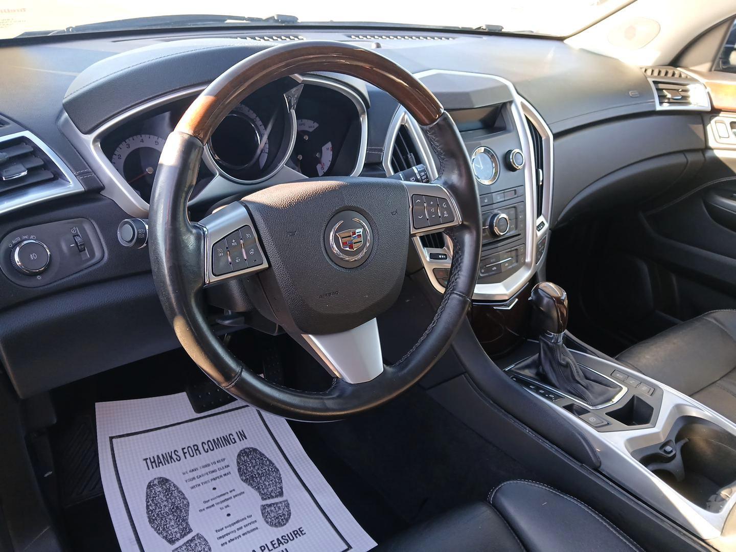 2012 Black Raven Cadillac SRX Premium AWD (3GYFNFE30CS) with an 3.6L V6 DOHC 24V FFV engine, 6-Speed Automatic transmission, located at 8750 N County Rd 25A, Piqua, OH, 45356, (937) 908-9800, 40.164391, -84.232513 - Photo#8