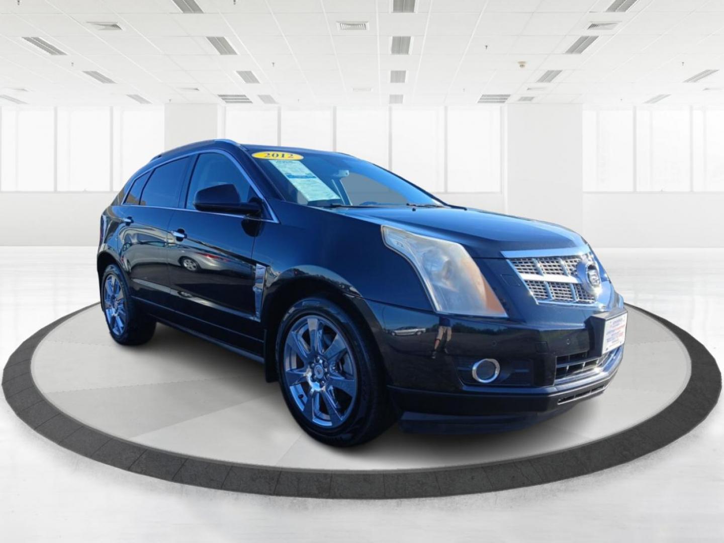 2012 Black Raven Cadillac SRX Premium AWD (3GYFNFE30CS) with an 3.6L V6 DOHC 24V FFV engine, 6-Speed Automatic transmission, located at 8750 N County Rd 25A, Piqua, OH, 45356, (937) 908-9800, 40.164391, -84.232513 - Photo#0