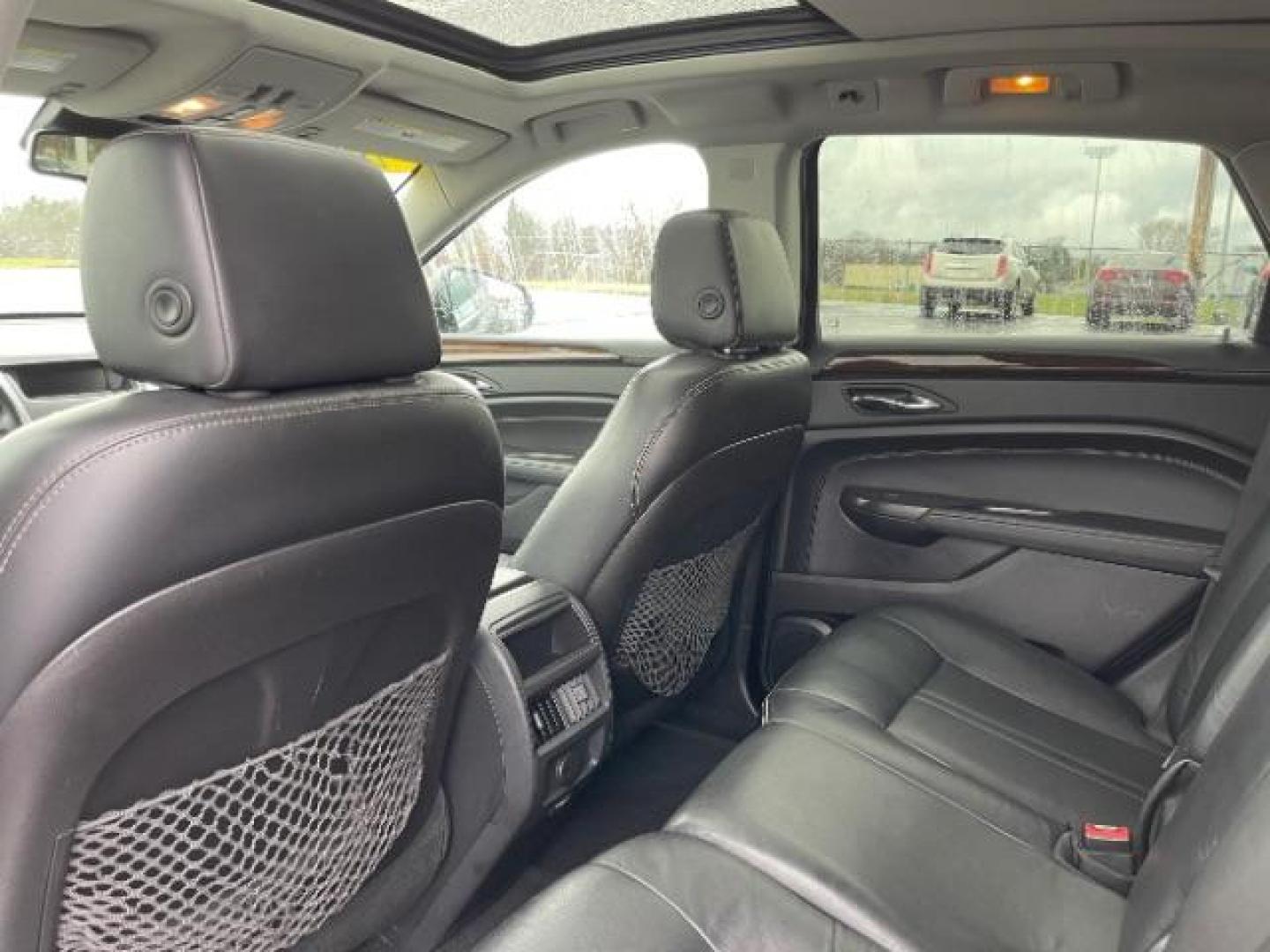 2012 Black Raven Cadillac SRX Luxury AWD (3GYFNDE35CS) with an 3.6L V6 DOHC 24V FFV engine, 6-Speed Automatic transmission, located at 1184 Kauffman Ave, Fairborn, OH, 45324, (937) 908-9800, 39.807072, -84.030914 - Photo#10