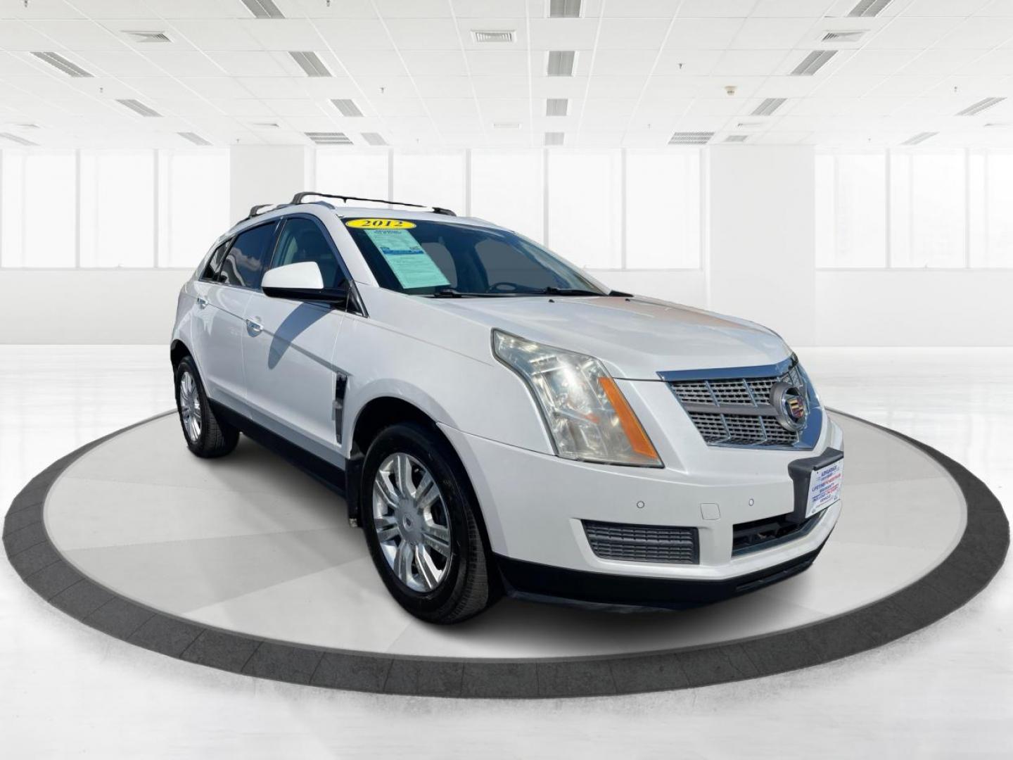 2012 White Cadillac SRX Luxury AWD (3GYFNDE38CS) with an 3.6L V6 DOHC 24V FFV engine, 6-Speed Automatic transmission, located at 1230 East Main St, Xenia, OH, 45385, (937) 908-9800, 39.688026, -83.910172 - Photo#0