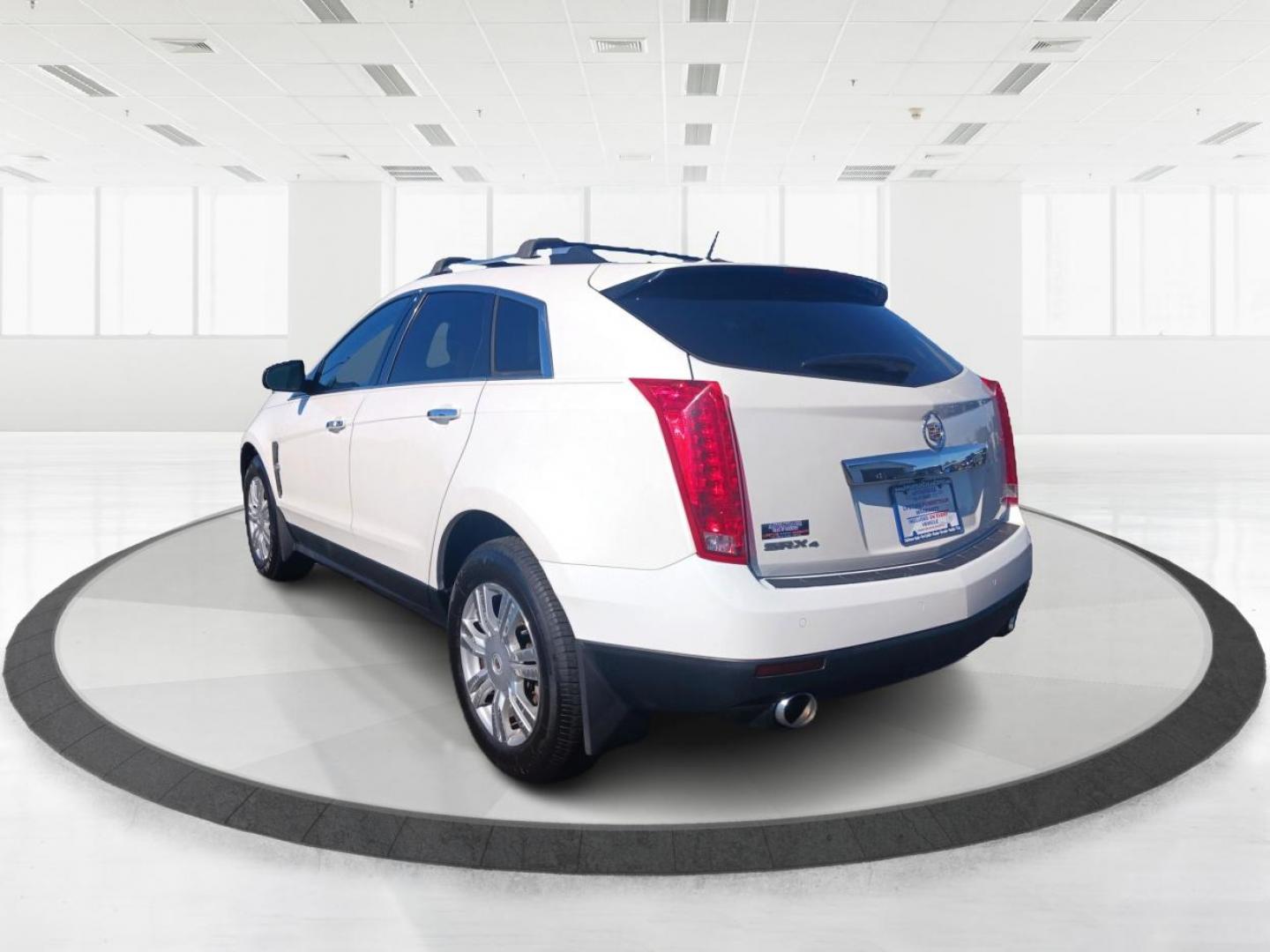 2012 White Cadillac SRX (3GYFNDE38CS) with an 3.6L V6 DOHC 24V FFV engine, 6-Speed Automatic transmission, located at 880 E. National Road, Vandalia, OH, 45377, (937) 908-9800, 39.891918, -84.183594 - Photo#4