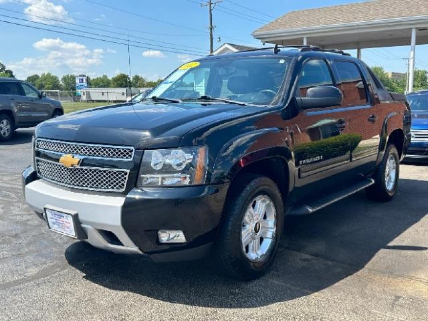 2012 Black Chevrolet Avalanche LT 4WD (3GNTKFE73CG) with an 5.3L V8 OHV 16V FFV engine, 4-Speed Automatic transmission, located at 1184 Kauffman Ave, Fairborn, OH, 45324, (937) 908-9800, 39.807072, -84.030914 - Photo#2