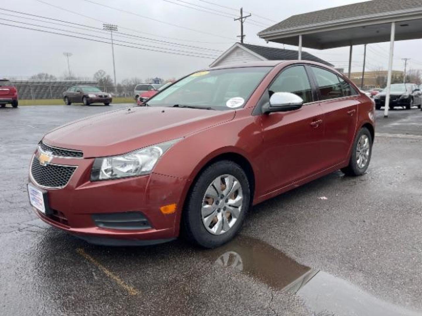 2012 Orange Chevrolet Cruze 2LS (1G1PC5SH1C7) with an 1.8L L4 DOHC 16V FFV engine, 6-Speed Automatic transmission, located at 4508 South Dixie Dr, Moraine, OH, 45439, (937) 908-9800, 39.689976, -84.218452 - Photo#1