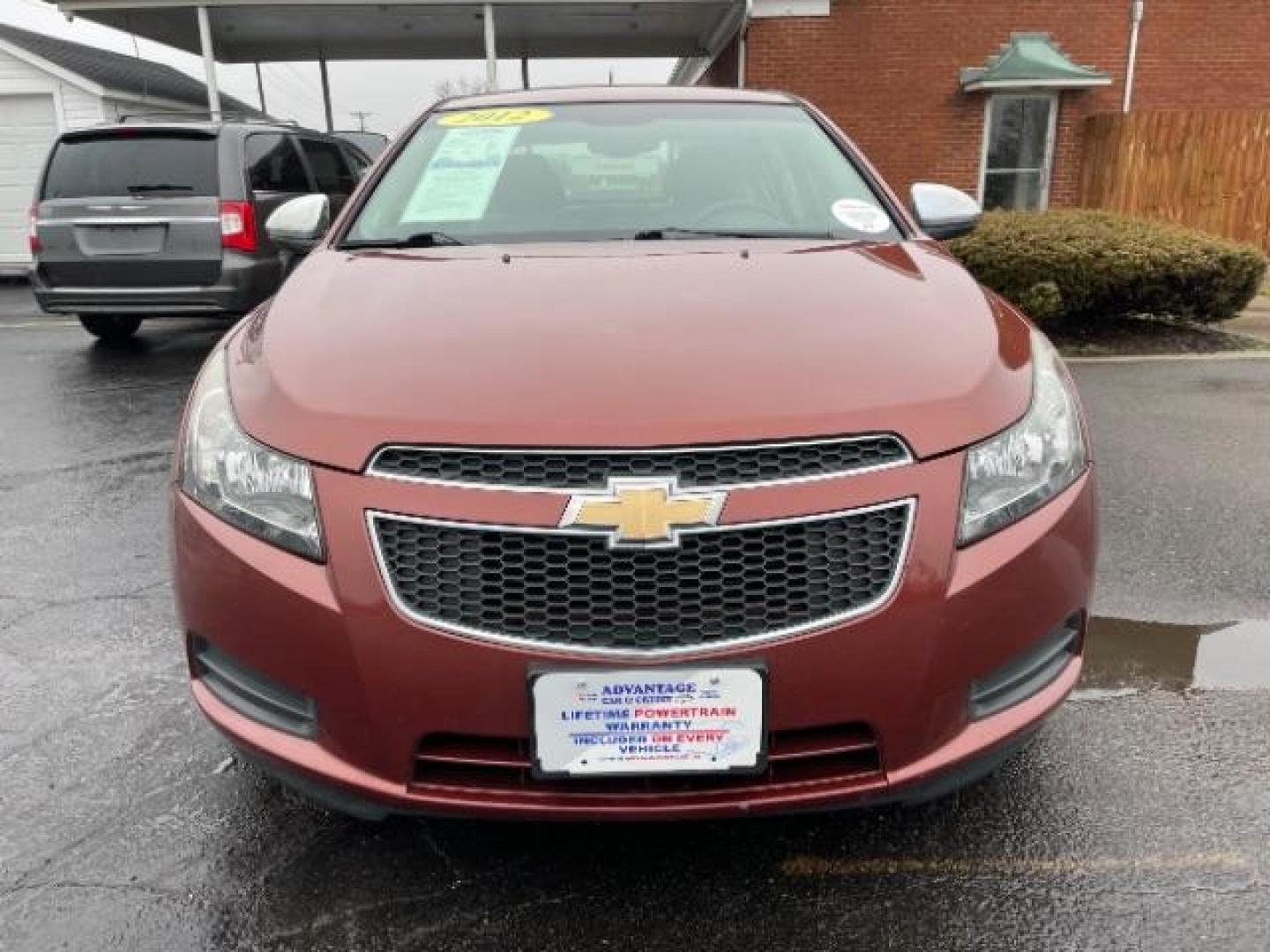 2012 Orange Chevrolet Cruze 2LS (1G1PC5SH1C7) with an 1.8L L4 DOHC 16V FFV engine, 6-Speed Automatic transmission, located at 4508 South Dixie Dr, Moraine, OH, 45439, (937) 908-9800, 39.689976, -84.218452 - Photo#2