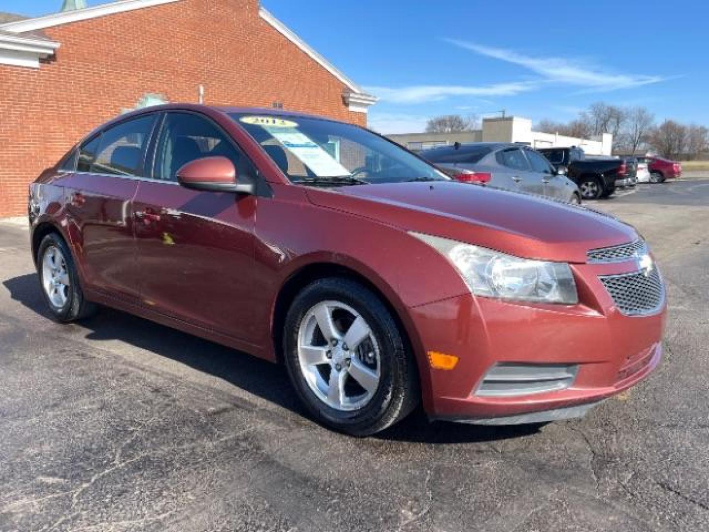 2012 Orange Chevrolet Cruze 1LT (1G1PF5SC6C7) with an 1.4L L4 DOHC 16V TURBO engine, 6-Speed Automatic transmission, located at 4508 South Dixie Dr, Moraine, OH, 45439, (937) 908-9800, 39.689976, -84.218452 - Photo#0