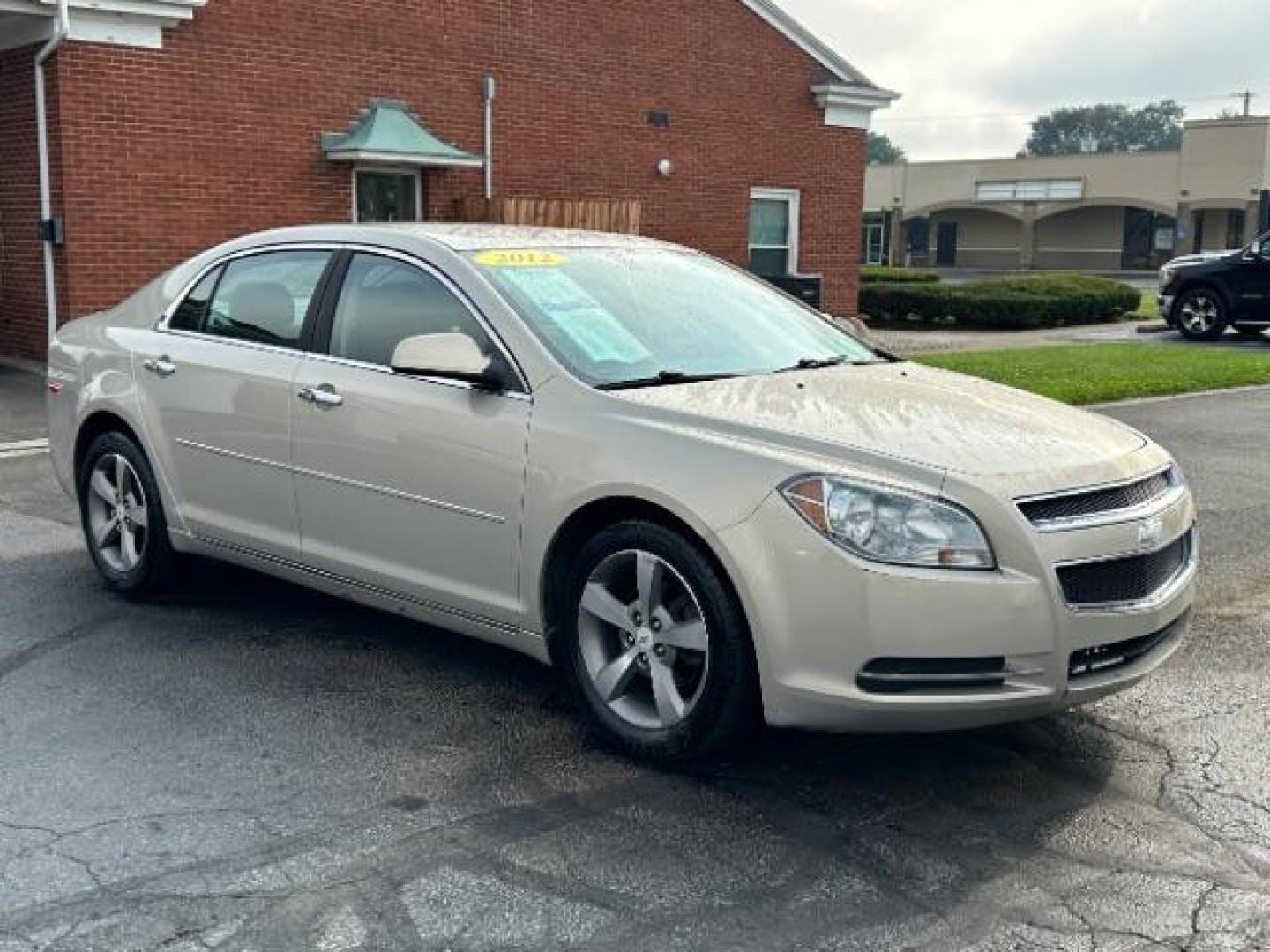 2012 Gold Mist Metallic Chevrolet Malibu 1LT (1G1ZC5E07CF) with an 2.4L L4 DOHC 16V engine, 6-Speed Automatic transmission, located at 1099 N County Rd 25A , Troy, OH, 45373, (937) 908-9800, 40.057079, -84.212883 - Photo#0