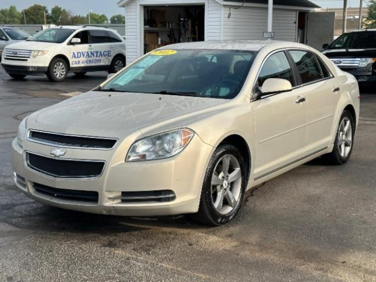 2012 Gold Mist Metallic Chevrolet Malibu 1LT (1G1ZC5E07CF) with an 2.4L L4 DOHC 16V engine, 6-Speed Automatic transmission, located at 1099 N County Rd 25A , Troy, OH, 45373, (937) 908-9800, 40.057079, -84.212883 - Photo#1