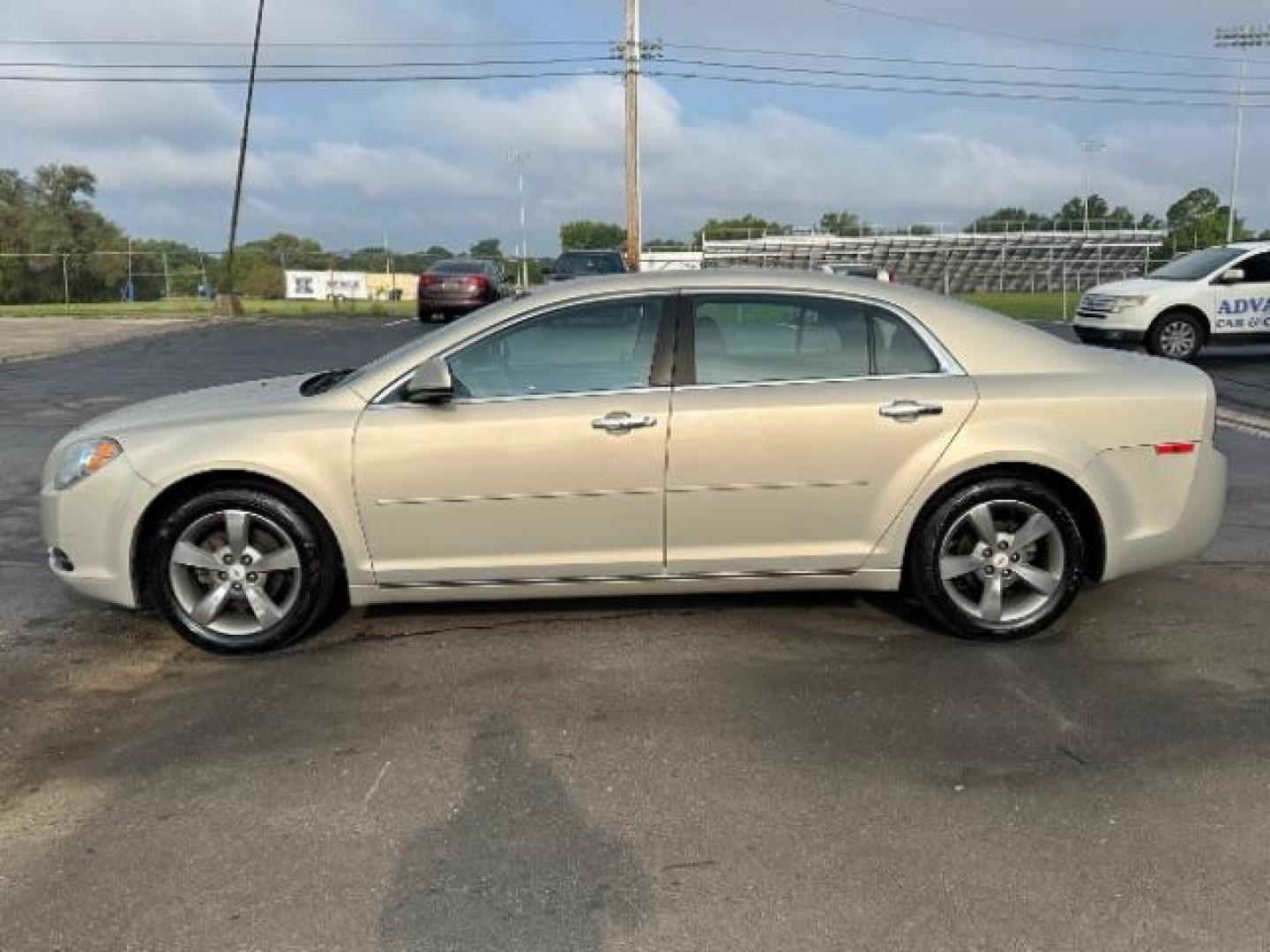 2012 Gold Mist Metallic Chevrolet Malibu 1LT (1G1ZC5E07CF) with an 2.4L L4 DOHC 16V engine, 6-Speed Automatic transmission, located at 1099 N County Rd 25A , Troy, OH, 45373, (937) 908-9800, 40.057079, -84.212883 - Photo#2