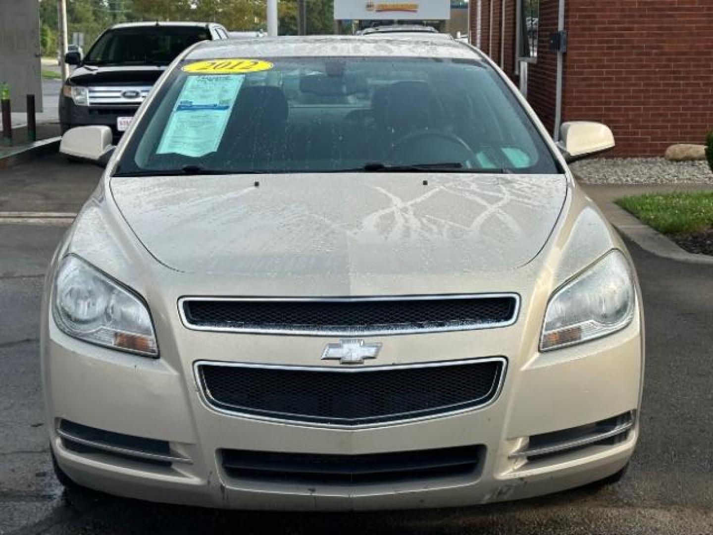 2012 Gold Mist Metallic Chevrolet Malibu 1LT (1G1ZC5E07CF) with an 2.4L L4 DOHC 16V engine, 6-Speed Automatic transmission, located at 1099 N County Rd 25A , Troy, OH, 45373, (937) 908-9800, 40.057079, -84.212883 - Photo#3