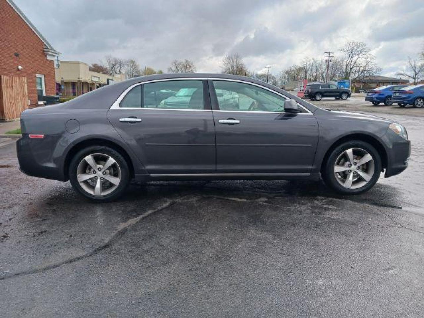 2012 Taupe Gray Metallic Chevrolet Malibu 1LT (1G1ZC5E03CF) with an 2.4L L4 DOHC 16V engine, 6-Speed Automatic transmission, located at 4508 South Dixie Dr, Moraine, OH, 45439, (937) 908-9800, 39.689976, -84.218452 - Photo#4