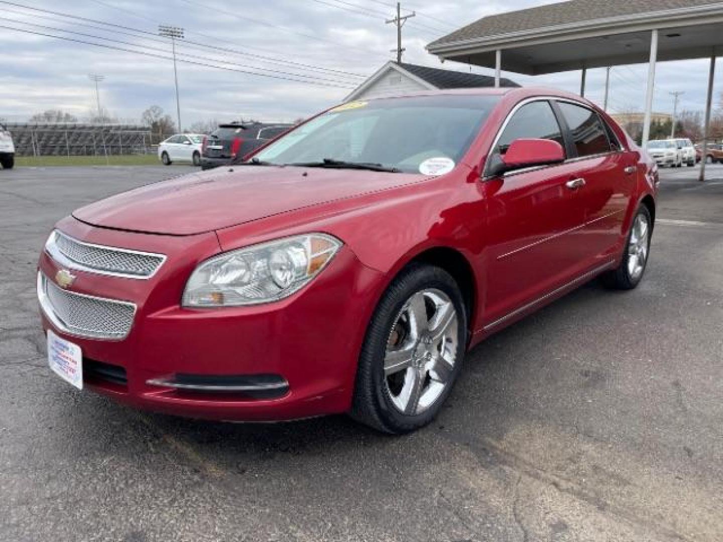 2012 Red Chevrolet Malibu 1LT (1G1ZC5E0XCF) with an 2.4L L4 DOHC 16V engine, 6-Speed Automatic transmission, located at 401 Woodman Dr, Riverside, OH, 45431, (937) 908-9800, 39.760899, -84.123421 - Photo#1