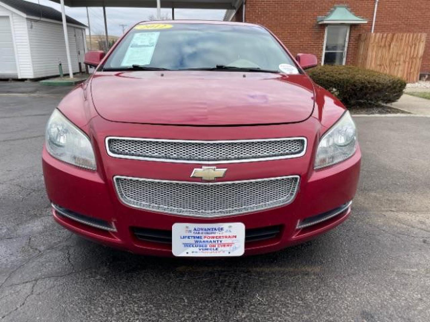 2012 Red Chevrolet Malibu 1LT (1G1ZC5E0XCF) with an 2.4L L4 DOHC 16V engine, 6-Speed Automatic transmission, located at 401 Woodman Dr, Riverside, OH, 45431, (937) 908-9800, 39.760899, -84.123421 - Photo#4