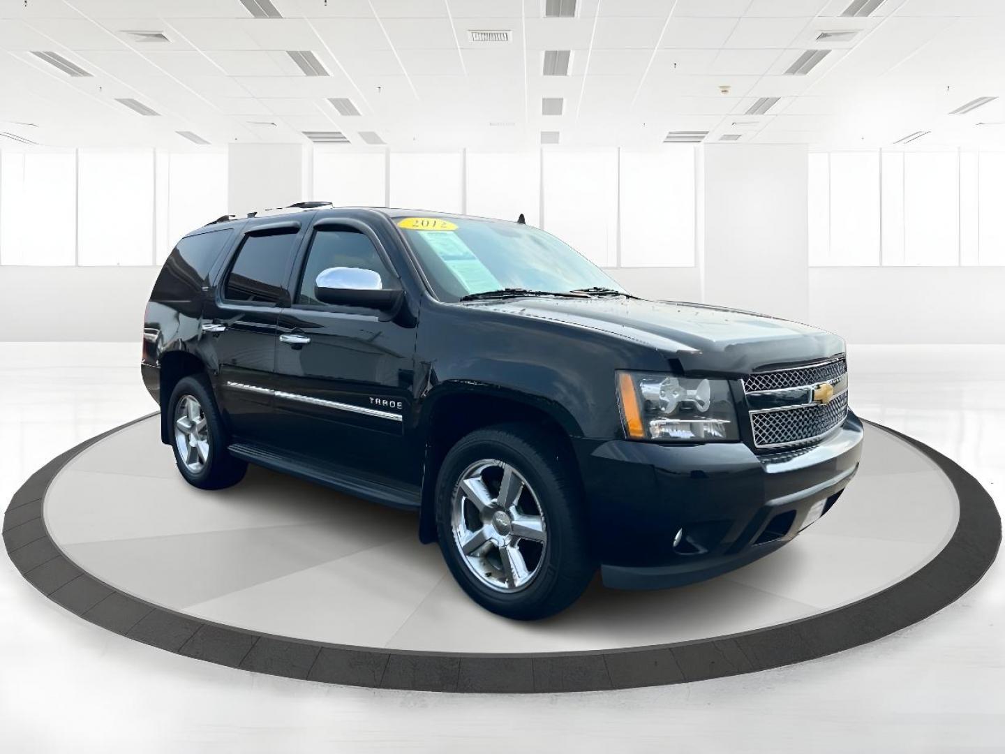 2012 Black Chevrolet Tahoe (1GNSKCE00CR) with an 5.3L V8 OHV 16V FFV engine, 6-Speed Automatic transmission, located at 401 Woodman Dr, Riverside, OH, 45431, (937) 908-9800, 39.760899, -84.123421 - Photo#0