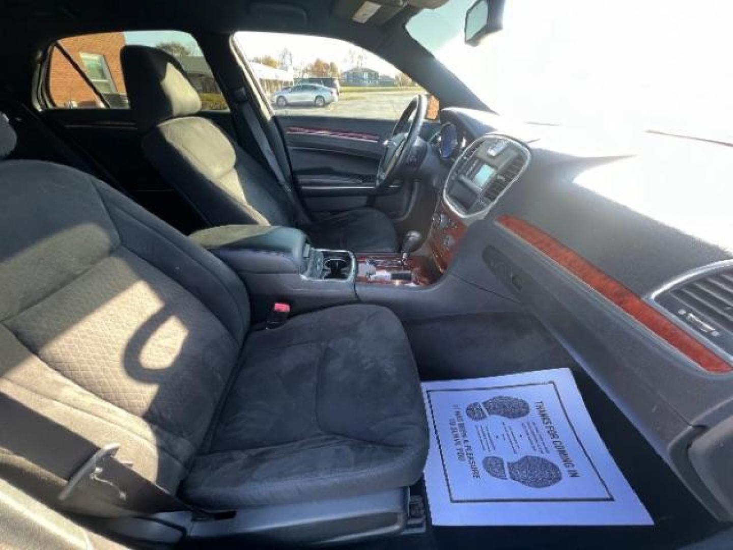 2012 Tungsten Metallic Chrysler 300 Base (2C3CCAAG9CH) with an 3.6L V6 SOHC 24V engine, 5-Speed Automatic transmission, located at 4508 South Dixie Dr, Moraine, OH, 45439, (937) 908-9800, 39.689976, -84.218452 - Photo#9