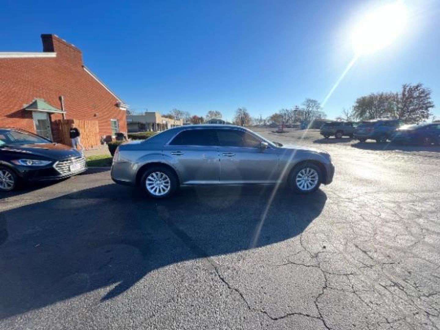 2012 Tungsten Metallic Chrysler 300 Base (2C3CCAAG9CH) with an 3.6L V6 SOHC 24V engine, 5-Speed Automatic transmission, located at 4508 South Dixie Dr, Moraine, OH, 45439, (937) 908-9800, 39.689976, -84.218452 - Photo#5