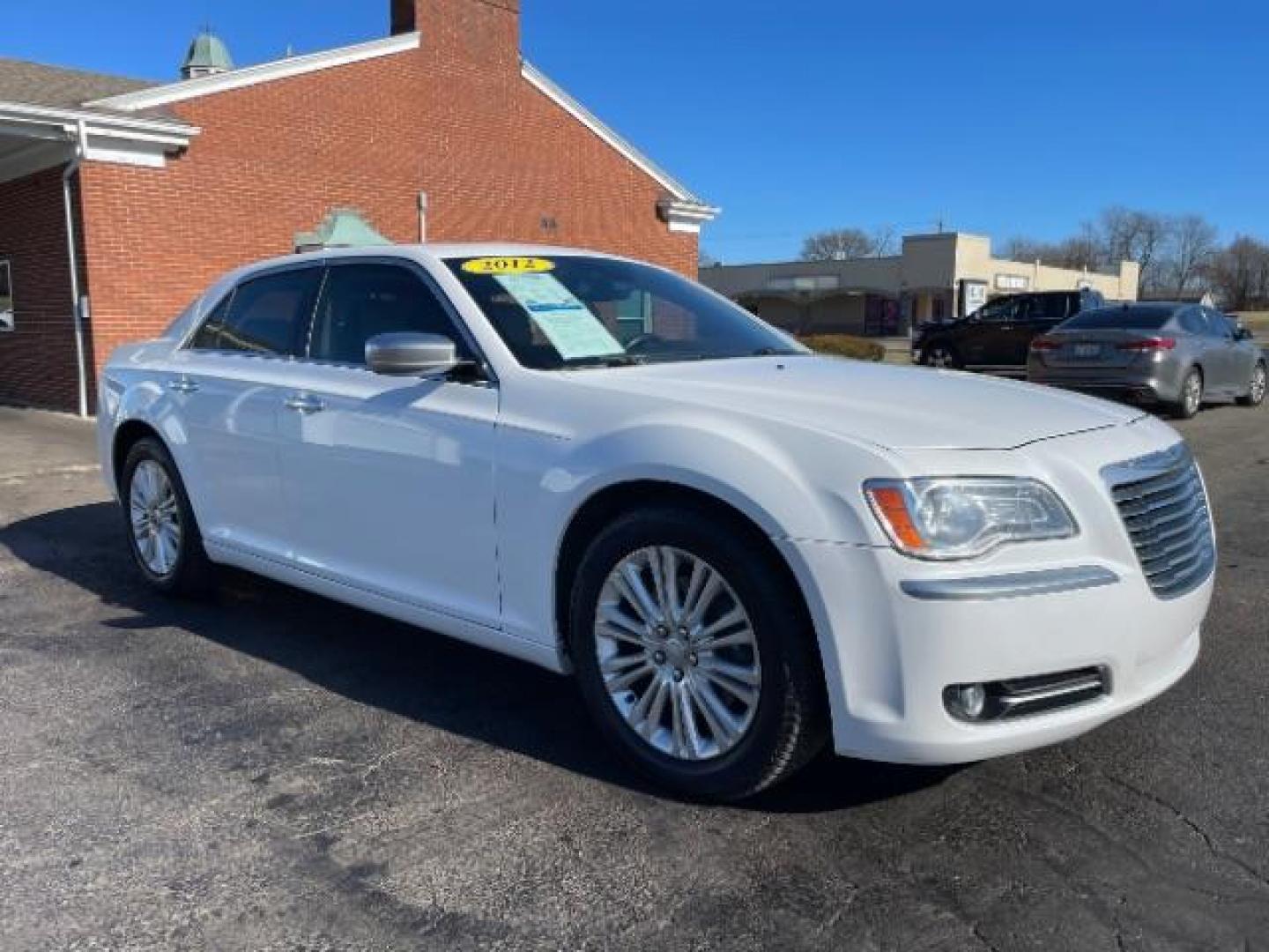 2012 Bright White Chrysler 300 C AWD (2C3CCAST7CH) with an 5.7L V8 OHV 16V engine, 5-Speed Automatic transmission, located at 1951 S Dayton Lakeview Rd., New Carlisle, OH, 45344, (937) 908-9800, 39.890999, -84.050255 - Photo#0