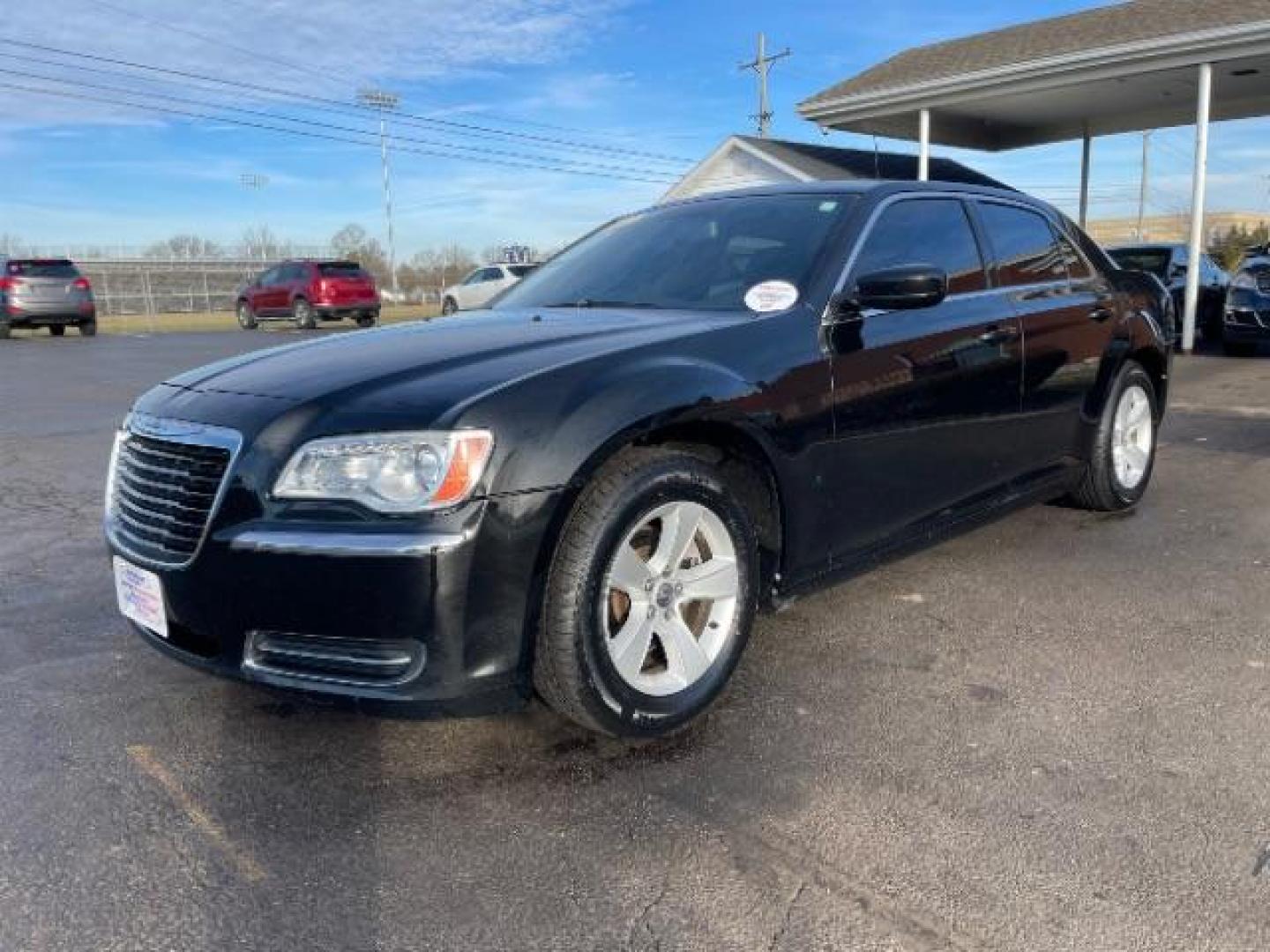 2012 Gloss Black Chrysler 300 Base (2C3CCAAG2CH) with an 3.6L V6 SOHC 24V engine, 5-Speed Automatic transmission, located at 401 Woodman Dr, Riverside, OH, 45431, (937) 908-9800, 39.760899, -84.123421 - Photo#1