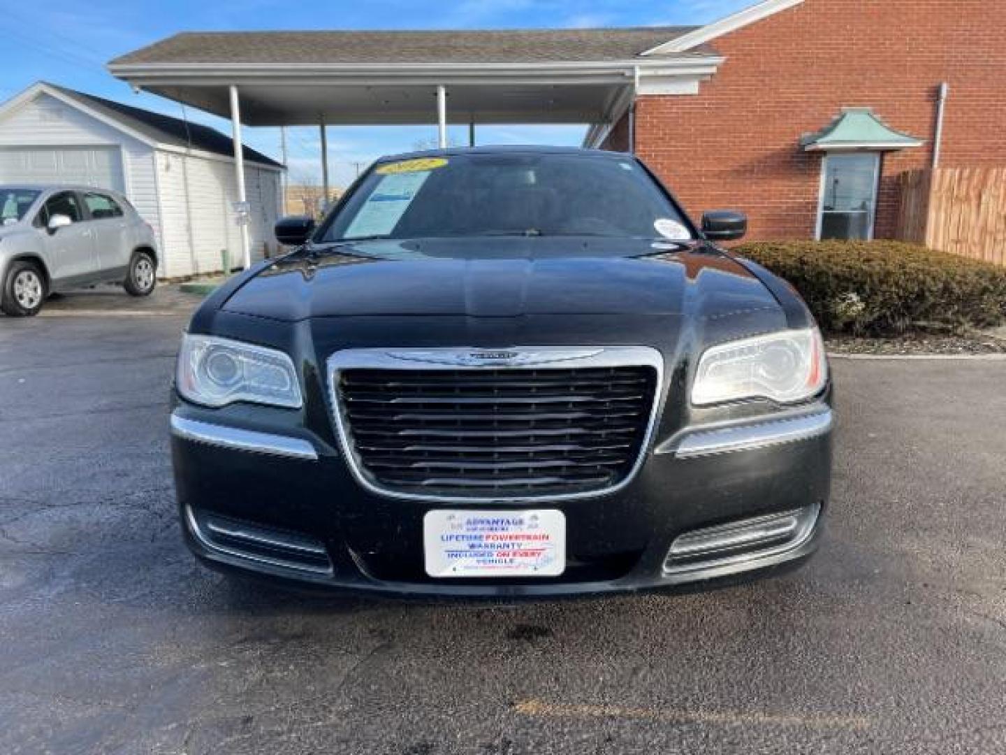 2012 Gloss Black Chrysler 300 Base (2C3CCAAG2CH) with an 3.6L V6 SOHC 24V engine, 5-Speed Automatic transmission, located at 401 Woodman Dr, Riverside, OH, 45431, (937) 908-9800, 39.760899, -84.123421 - Photo#4