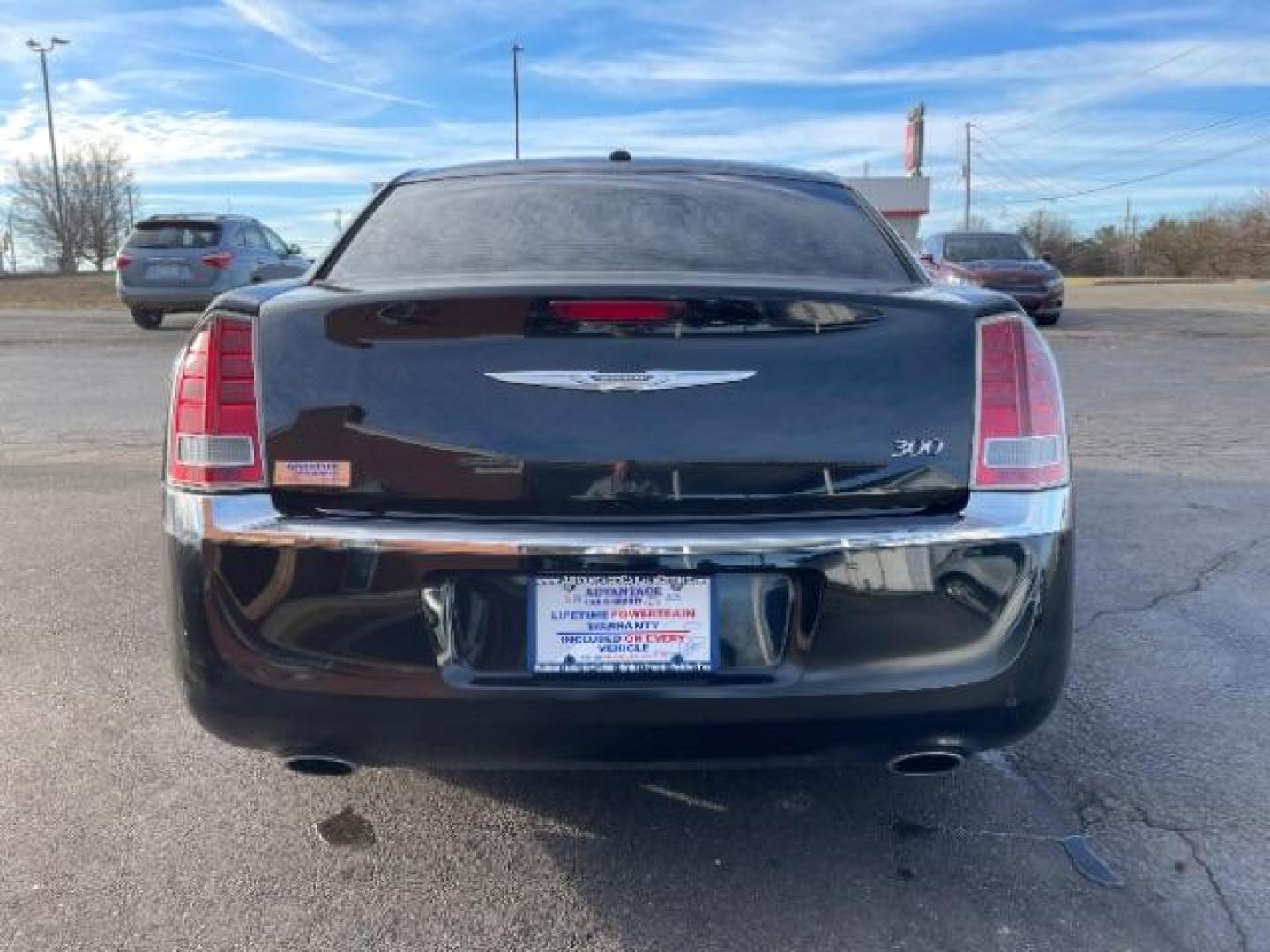 2012 Gloss Black Chrysler 300 Base (2C3CCAAG2CH) with an 3.6L V6 SOHC 24V engine, 5-Speed Automatic transmission, located at 401 Woodman Dr, Riverside, OH, 45431, (937) 908-9800, 39.760899, -84.123421 - Photo#5