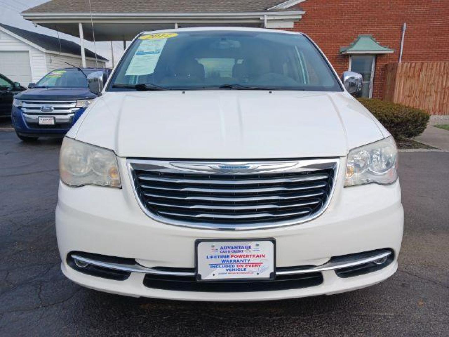 2012 Stone White Chrysler Town and Country Touring-L (2C4RC1CG4CR) with an 3.6L V6 DOHC 24V engine, 6-Speed Automatic transmission, located at 1099 N County Rd 25A , Troy, OH, 45373, (937) 908-9800, 40.057079, -84.212883 - Photo#1