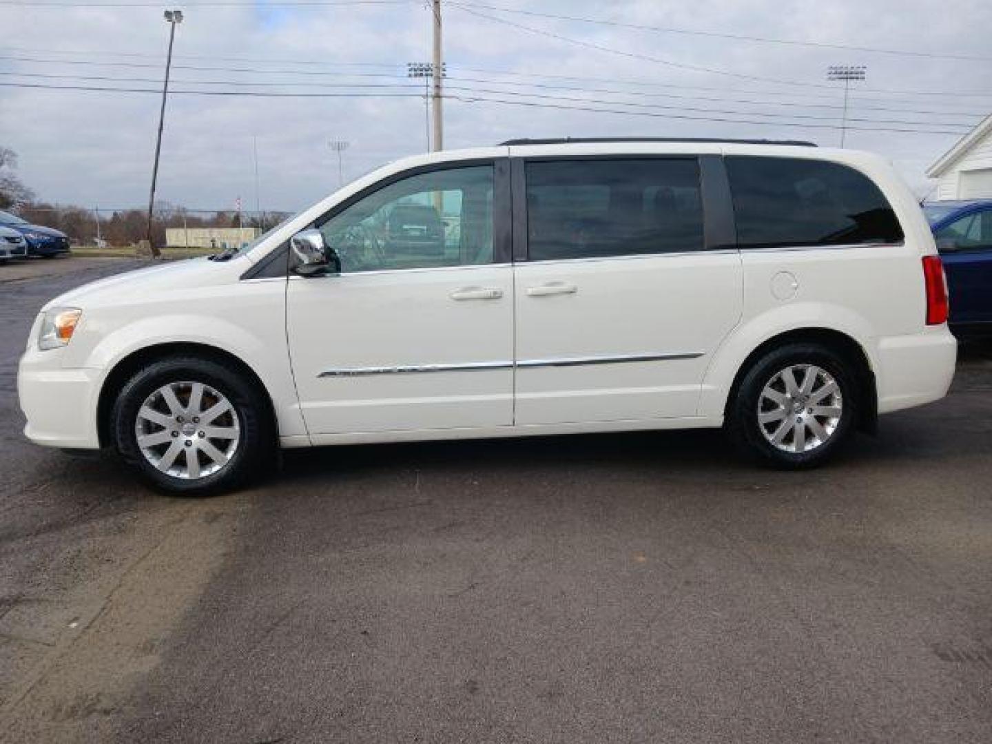 2012 Stone White Chrysler Town and Country Touring-L (2C4RC1CG4CR) with an 3.6L V6 DOHC 24V engine, 6-Speed Automatic transmission, located at 1099 N County Rd 25A , Troy, OH, 45373, (937) 908-9800, 40.057079, -84.212883 - Photo#3