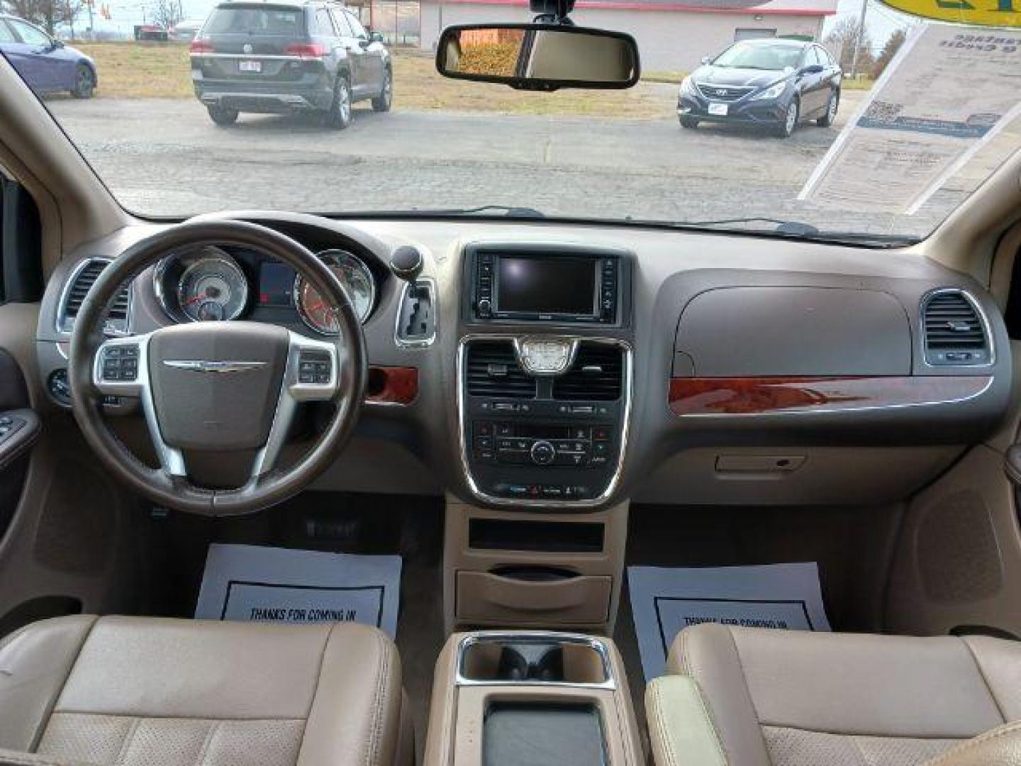 2012 Stone White Chrysler Town and Country Touring-L (2C4RC1CG4CR) with an 3.6L V6 DOHC 24V engine, 6-Speed Automatic transmission, located at 1099 N County Rd 25A , Troy, OH, 45373, (937) 908-9800, 40.057079, -84.212883 - Photo#7