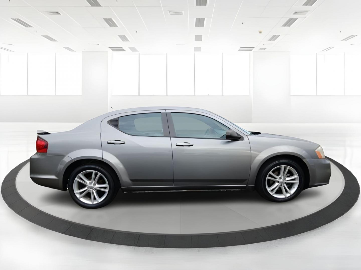 2012 Bright Silver Metallic Dodge Avenger SE (1C3CDZAG6CN) with an 3.6L V6 DOHC 24V FFV engine, 6-Speed Automatic transmission, located at 880 E. National Road, Vandalia, OH, 45377, (937) 908-9800, 39.891918, -84.183594 - Photo#1