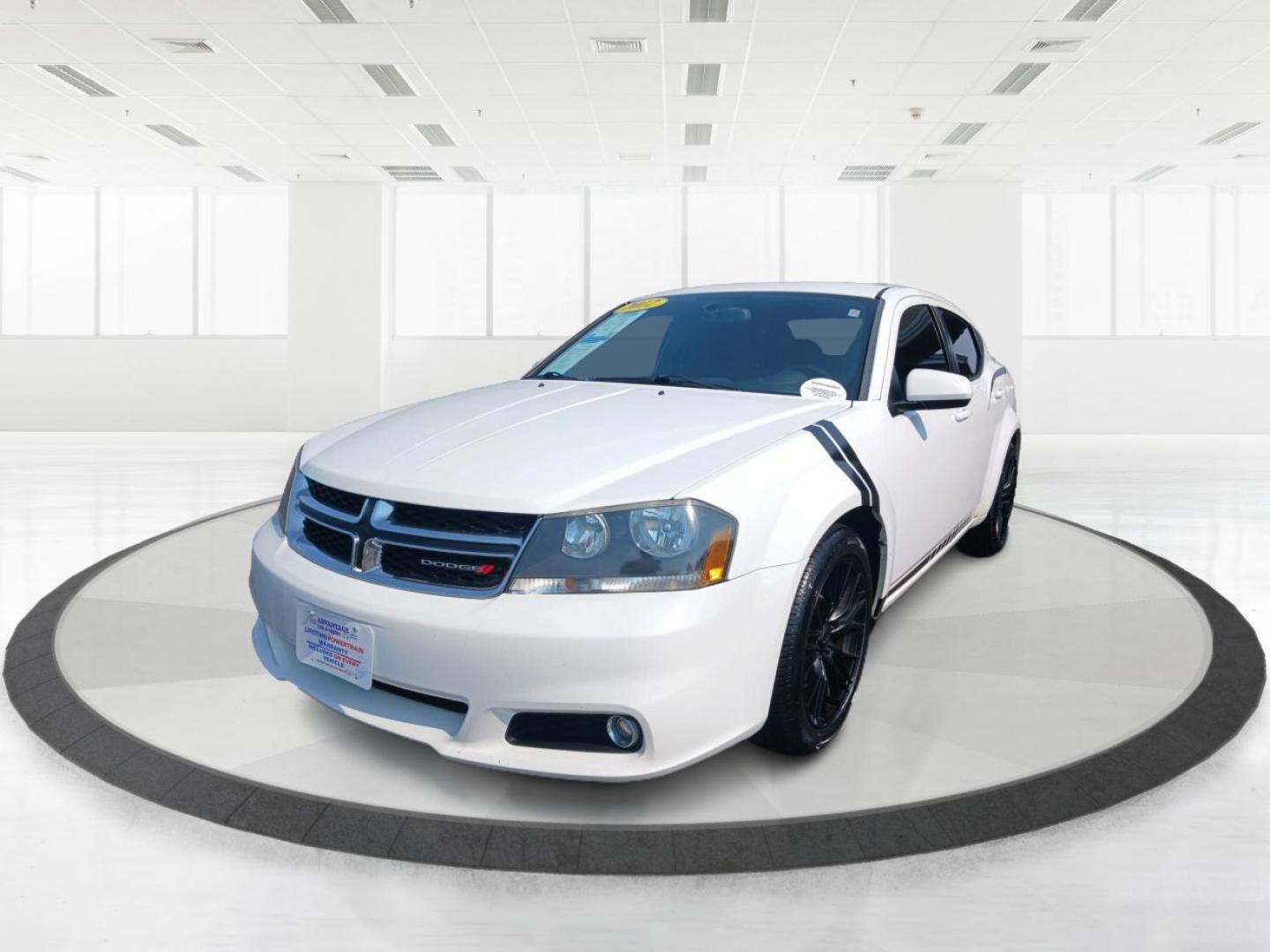 2012 Bright White Dodge Avenger (1C3CDZEG8CN) with an 3.6L V6 DOHC 24V FFV engine, 6-Speed Automatic transmission, located at 4508 South Dixie Dr, Moraine, OH, 45439, (937) 908-9800, 39.689976, -84.218452 - Photo#7