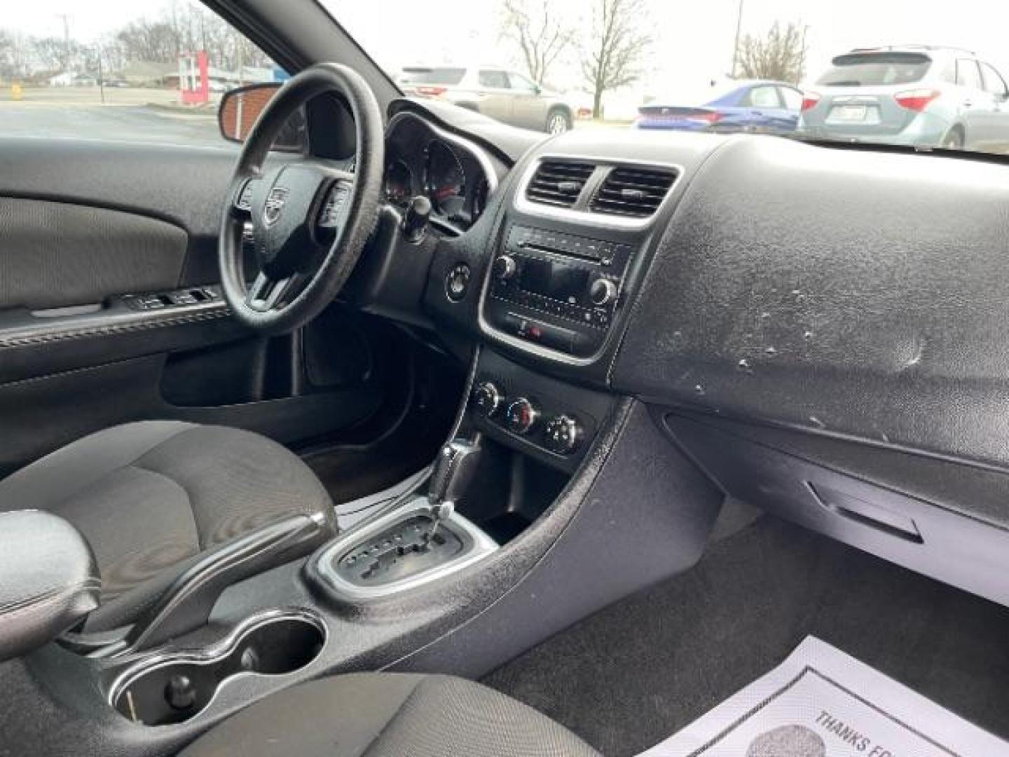 2012 Orange Dodge Avenger Base (1C3CDZAB1CN) with an 2.4L L4 DOHC 16V engine, 4-Speed Automatic transmission, located at 4508 South Dixie Dr, Moraine, OH, 45439, (937) 908-9800, 39.689976, -84.218452 - Photo#8