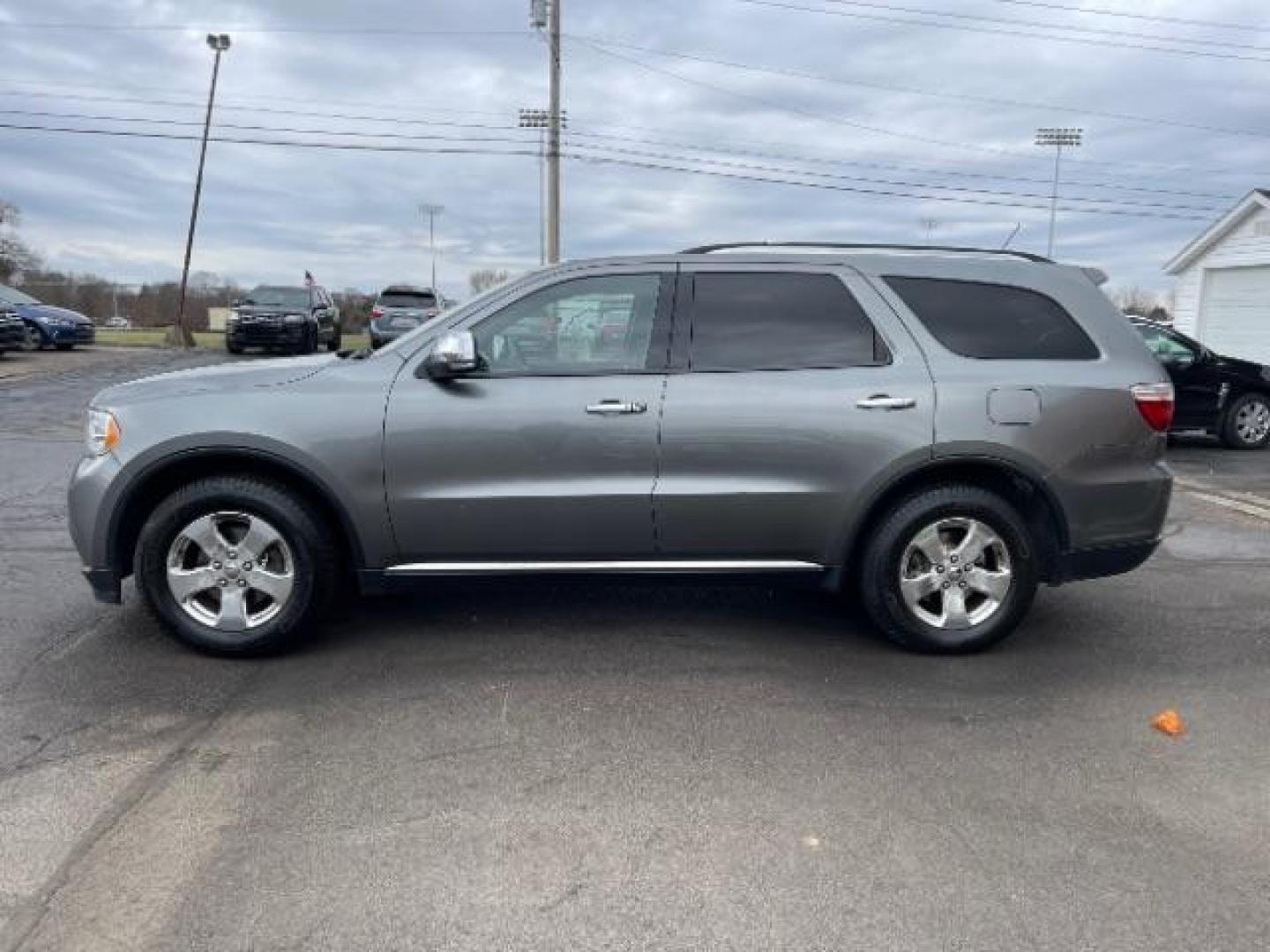 2012 Mineral Gray Metallic Dodge Durango Crew AWD (1C4RDJDG7CC) with an 3.6L V6 DOHC 24V engine, 5-Speed Automatic transmission, located at 1184 Kauffman Ave, Fairborn, OH, 45324, (937) 908-9800, 39.807072, -84.030914 - Photo#2