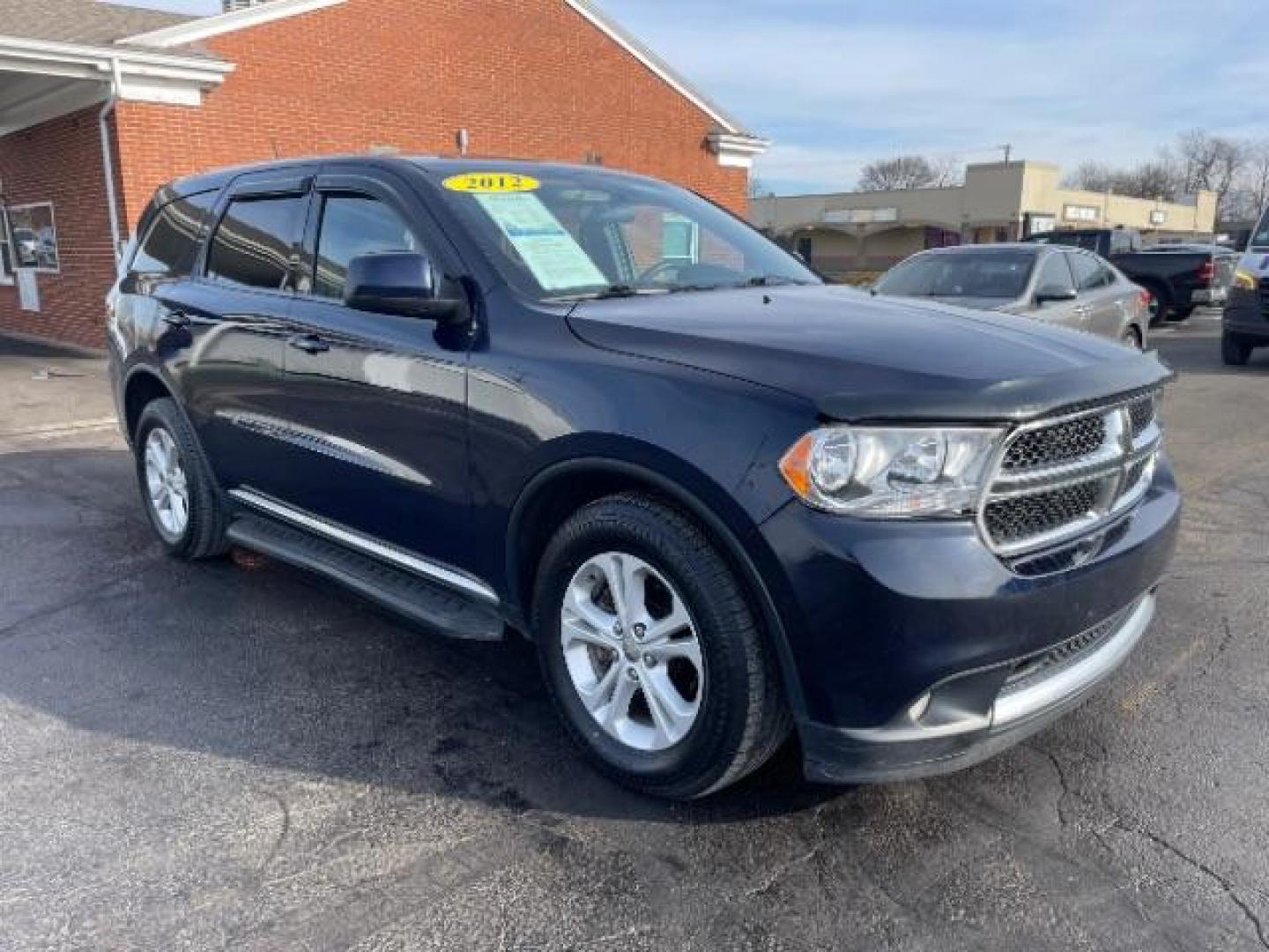 2012 True Blue Pearl Dodge Durango SXT AWD (1C4RDJAGXCC) with an 3.6L V6 DOHC 24V engine, 5-Speed Automatic transmission, located at 401 Woodman Dr, Riverside, OH, 45431, (937) 908-9800, 39.760899, -84.123421 - Photo#0