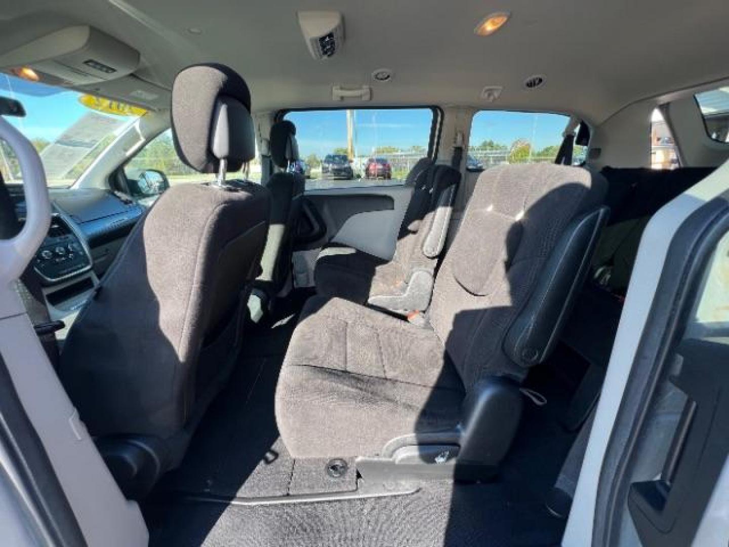 2012 Bright Silver Metallic Dodge Grand Caravan SXT (2C4RDGCG8CR) with an 3.6L V6 DOHC 24V engine, 6-Speed Automatic transmission, located at 880 E. National Road, Vandalia, OH, 45377, (937) 908-9800, 39.891918, -84.183594 - Photo#7